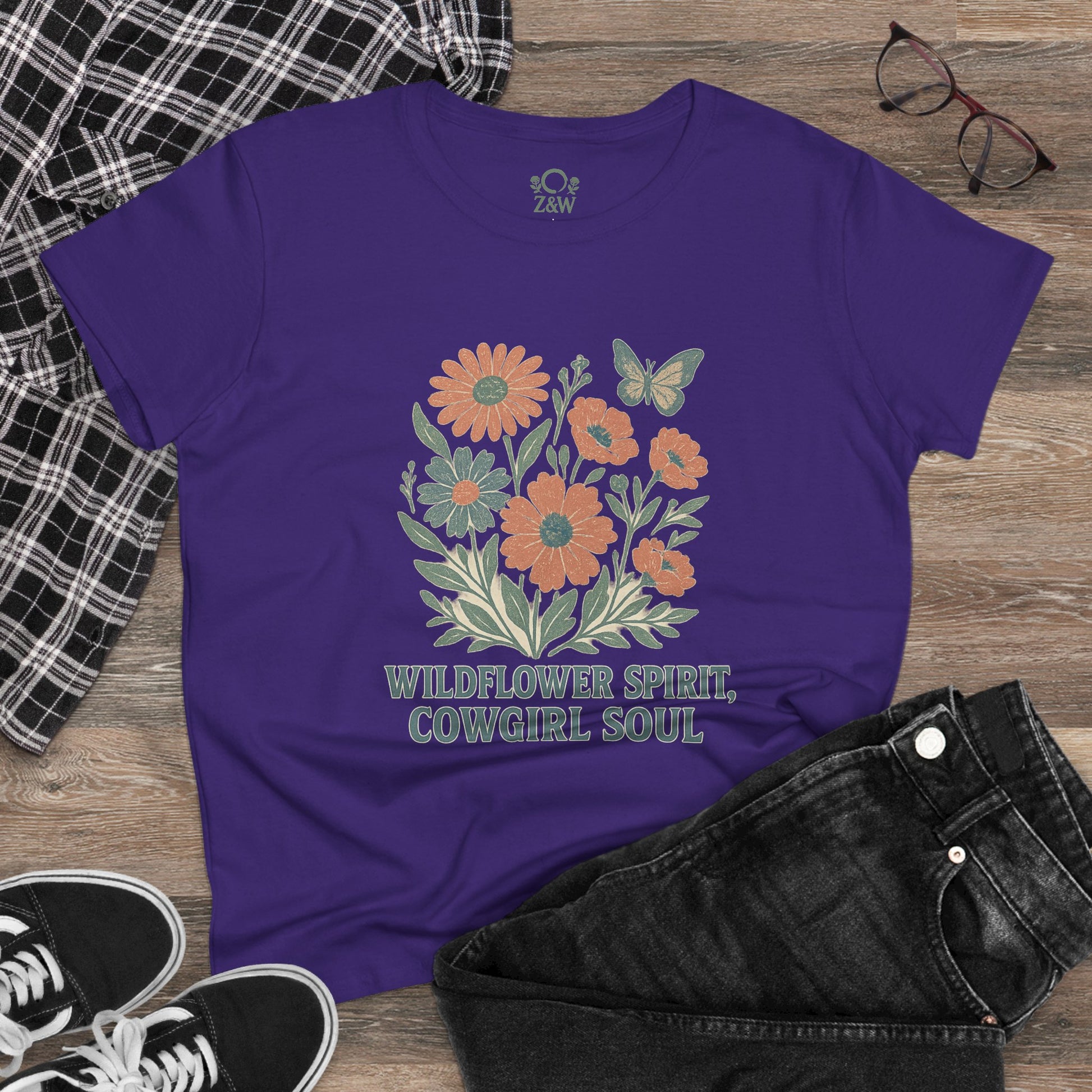 Wildflower Spirit Cotton Tee in purple, showcasing a vibrant floral design along with a butterfly, perfect for casual wear.