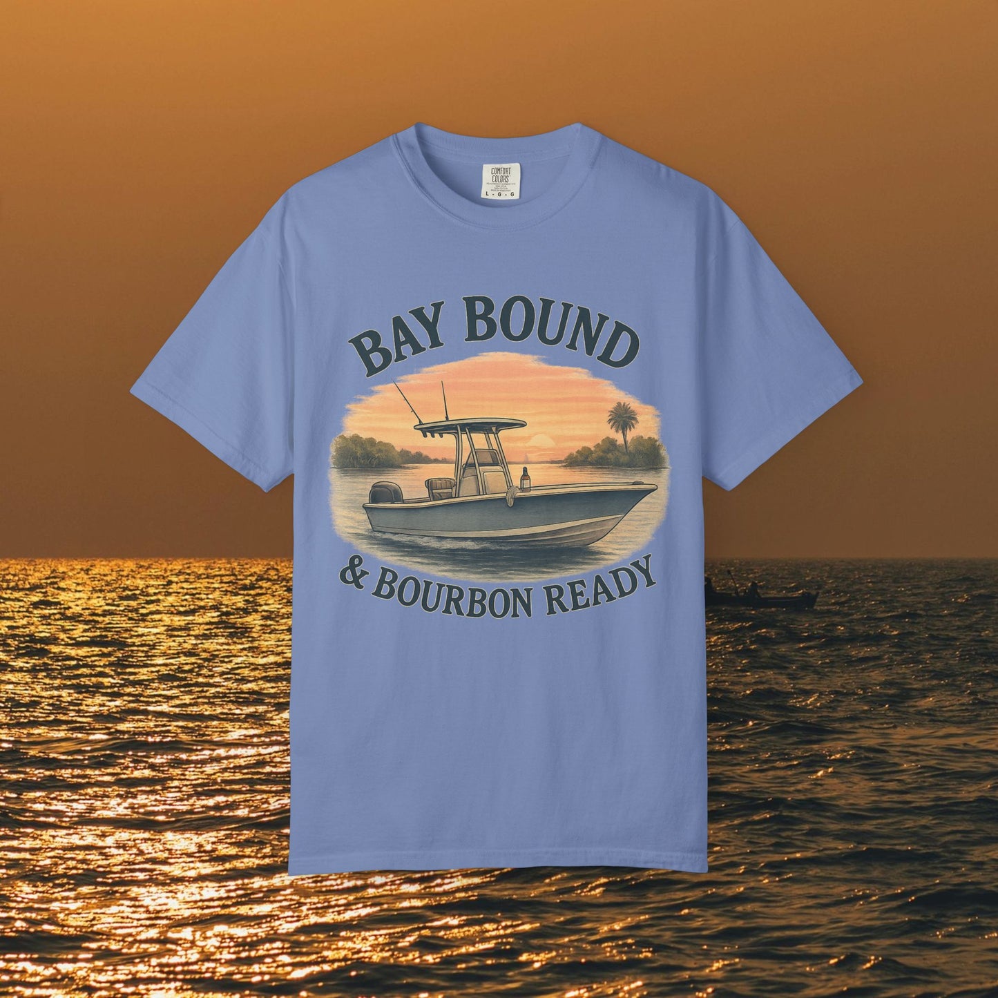 Bay Bound & Bourbon Ready T-Shirt for summer, featuring a boat design against a sunset background, perfect for fishing and beach lovers.