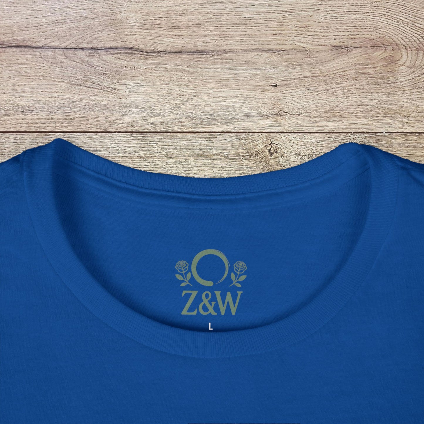 Close-up of the neckline of a blue Funny Pilates T-Shirt highlighting durable shoulder tape and Z&W logo, crafted for everyday style.