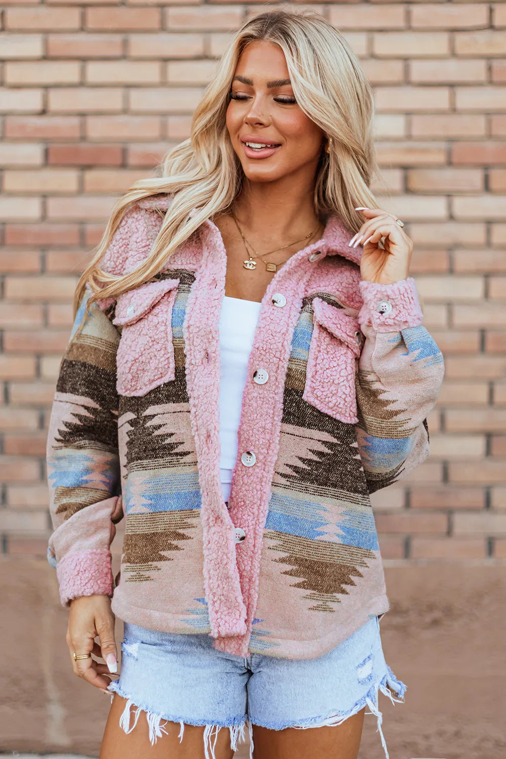 Trendsi Button Up Long Sleeve Jacket showcasing its unique pink and brown design, model wearing it with a white top and denim shorts.