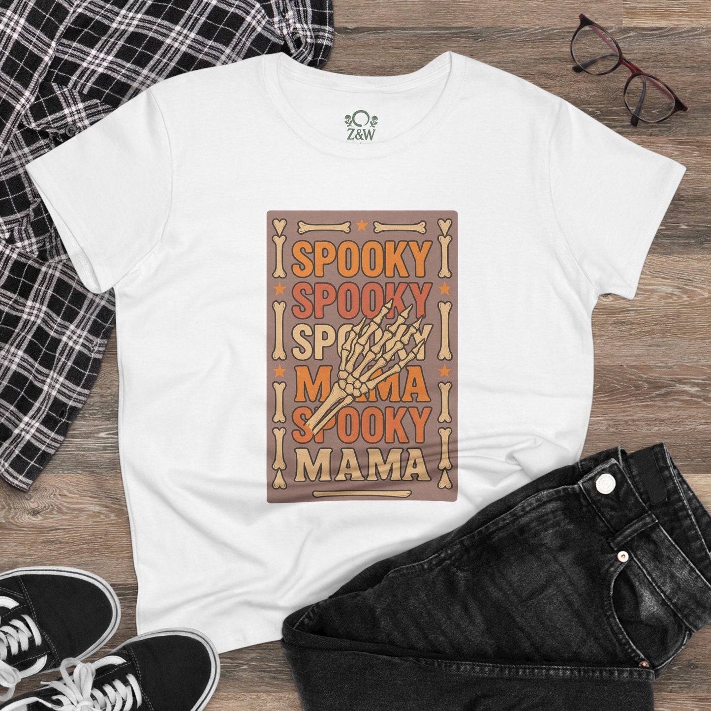 Spooky Mama Tee styled with casual black jeans and sneakers, highlighting its versatility for any outfit.