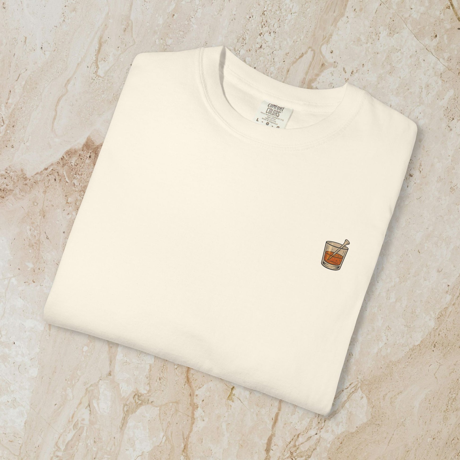 Golden Whiskey Dog Tee - Unique Vintage Style, featuring an illustration of a whiskey glass pocket design on a white 100% cotton tee.