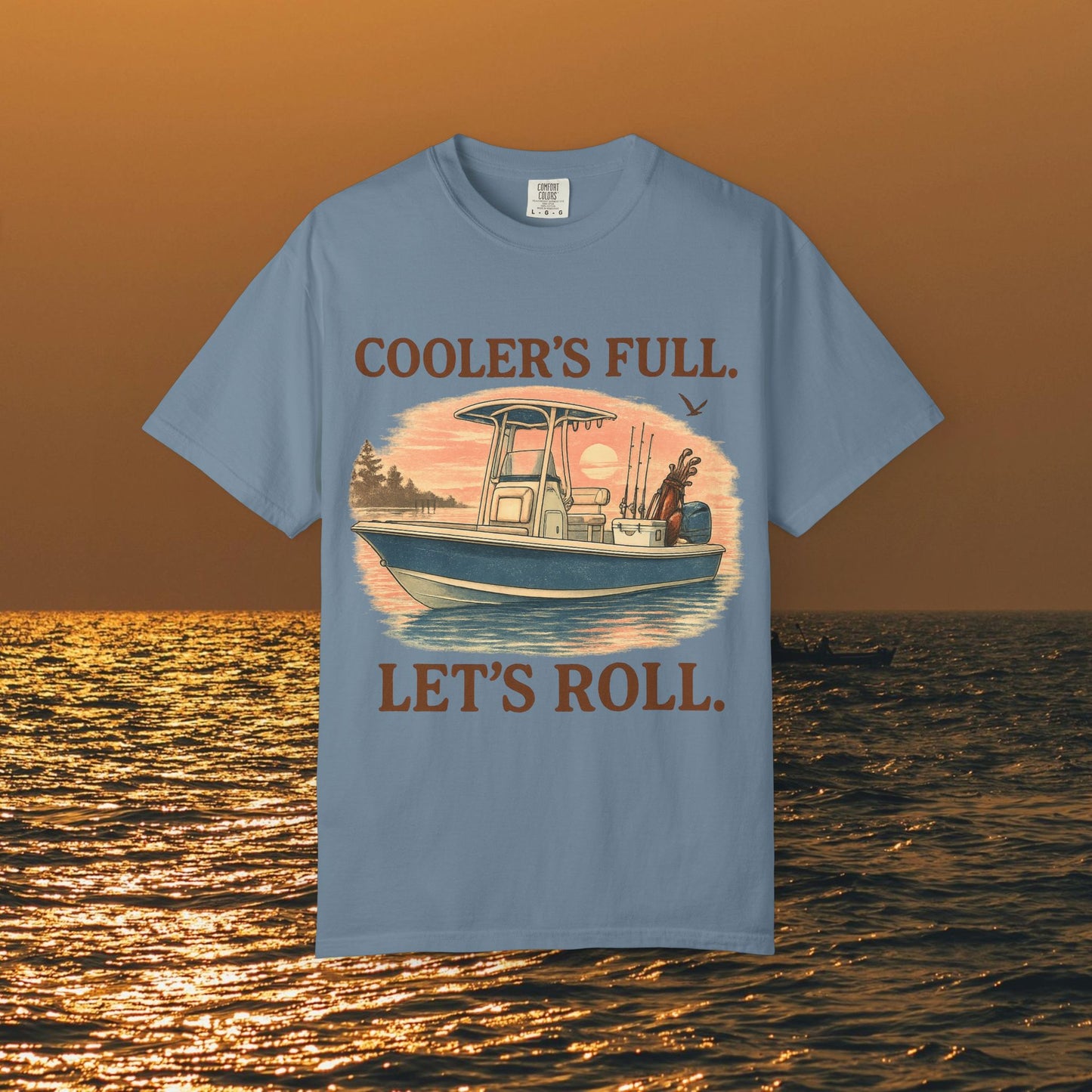 Men's & Women's Durable Cotton Full Tee in light blue showcasing a vibrant fishing boat graphic with 'Cooler's Full. Let's Roll.' inscription. Available in sizes S to 4XL.
