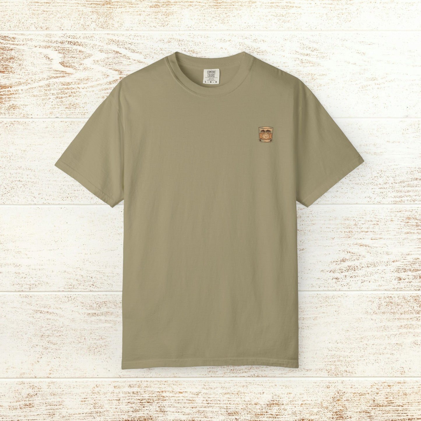 Rodeo On The Rocks Tee in olive green, featuring durable garment-dyed style, perfect for comfortable everyday use. Available in sizes S to 4XL.