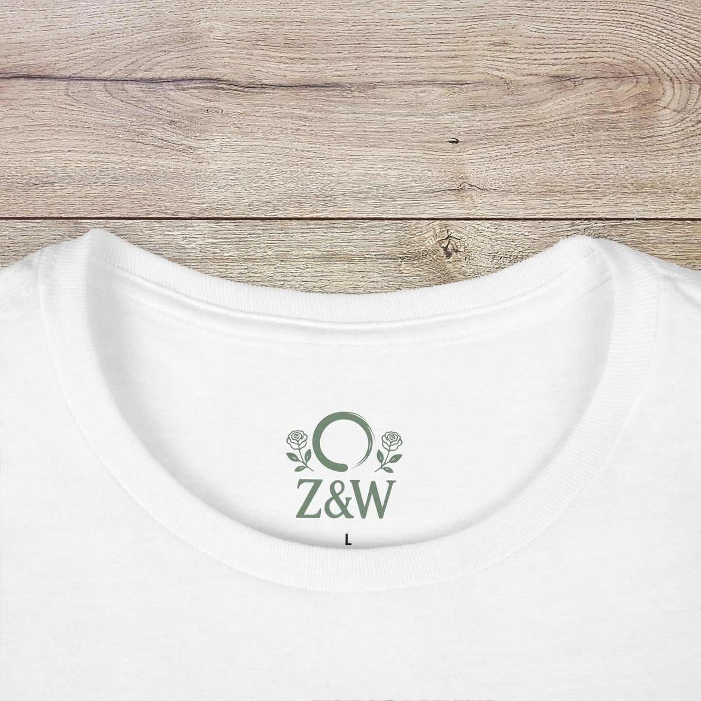 Close-up of the neckline detail of a white Halloween Family T-Shirt - Raising Little Monsters Cute Kids Tee for Parties & Costumes, featuring a brand logo.