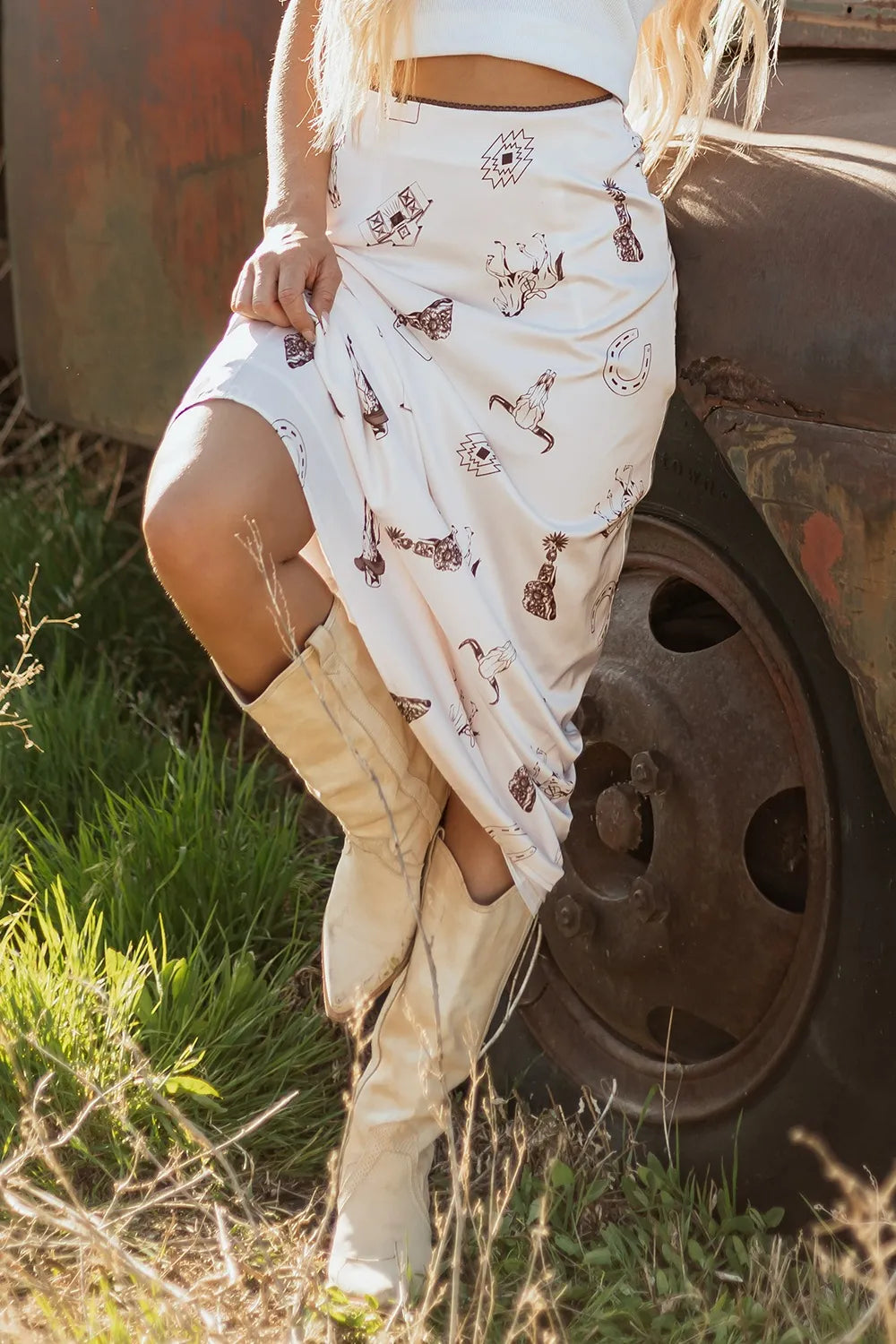 Close-up view of Trendsi Western Print Satin Long Skirt with artistic western motifs, perfect for fashionable looks.