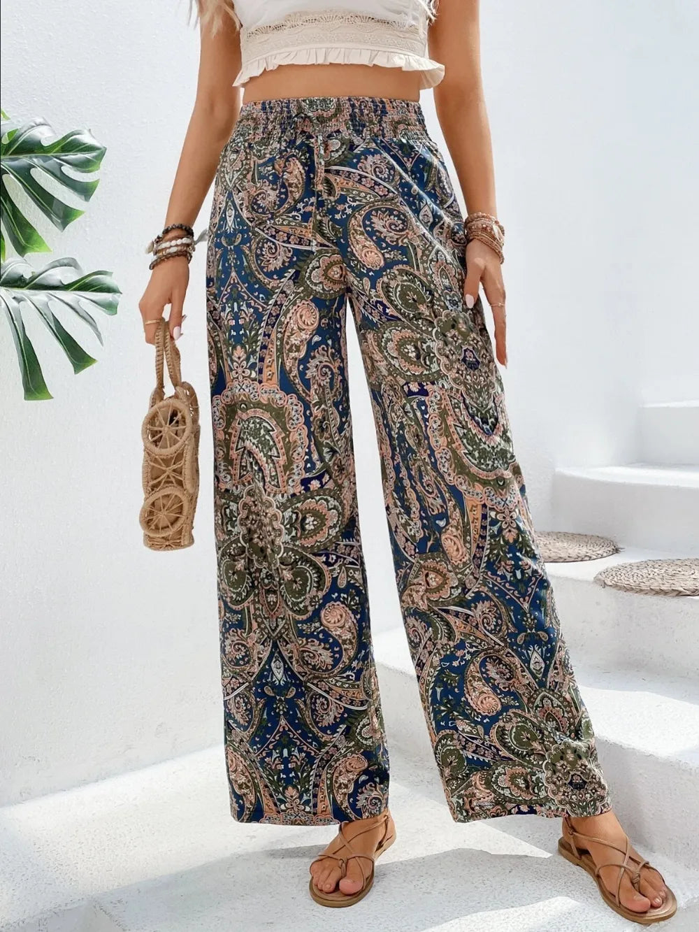 Trendy Printed Wide Leg Pants with Tied Detail in a stunning blue paisley design, demonstrating the versatility of 100% opaque polyester fabric for stylish summer wear.