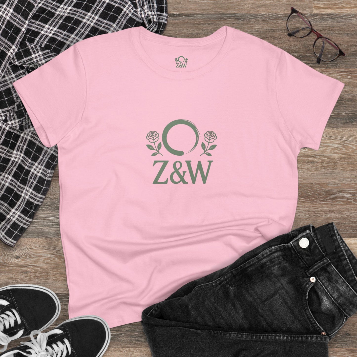 ZenAndWhiskey Classic 100% Cotton Tee in pink laid flat, featuring Z&W logo with roses, a stylish choice for all occasions.