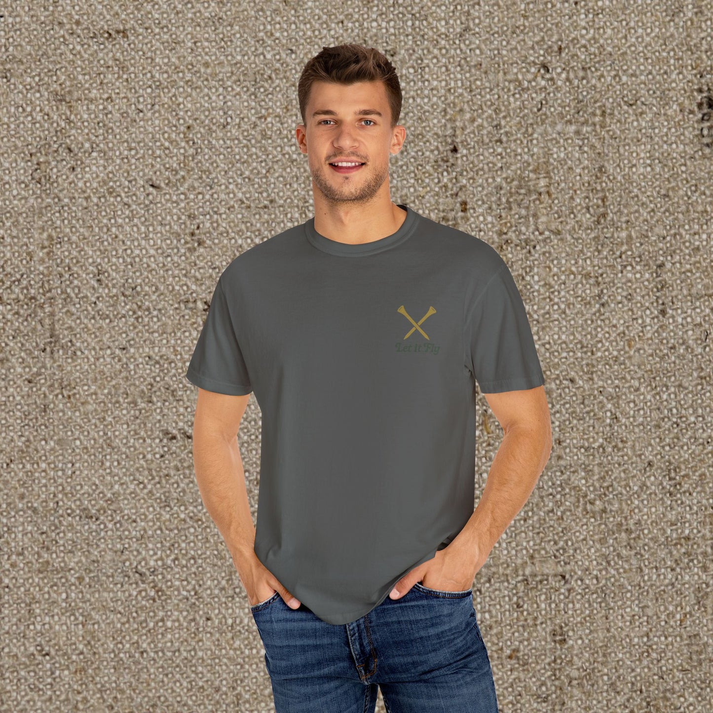 Model wearing the Tee It High Let It Fly Graphic Tee in dark gray, featuring comfortable fit and stylish design perfect for any occasion.