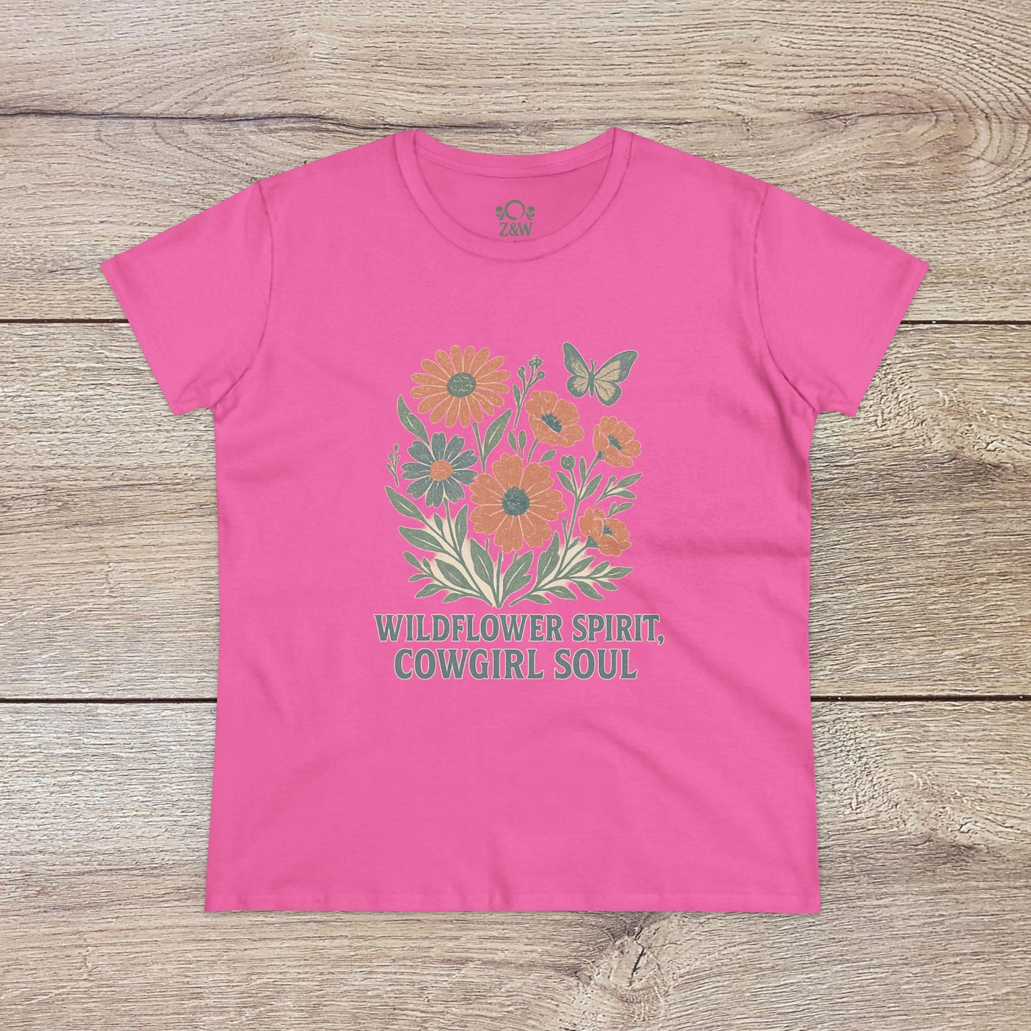 Wildflower Spirit Cotton Tee in a bright pink shade, complete with floral graphics and 'WILDFLOWER SPIRIT, COWGIRL SOUL' text - a trendy addition to any wardrobe.