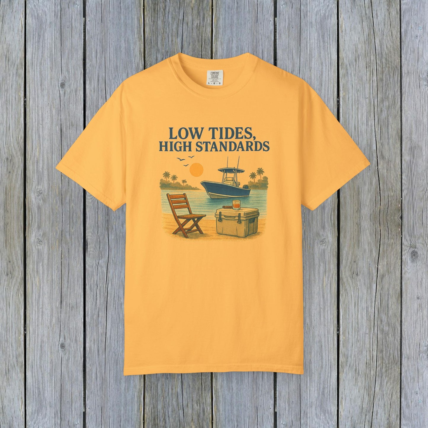 Garment-Dyed Low Tides High Standards T-Shirt in yellow, featuring vibrant graphics of a boat and chair set against a beach backdrop, perfect for summer days.