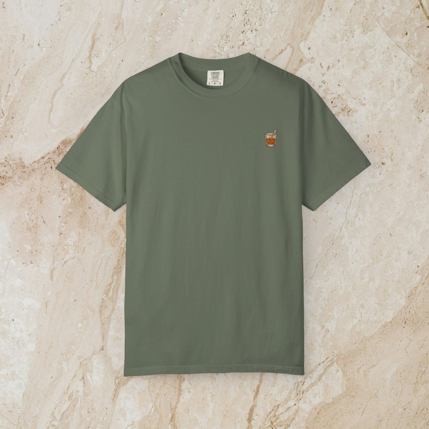 Golden Whiskey Dog Tee in olive green color, featuring a unique vintage style, 100% cotton fabric, relaxed fit, and a left chest pocket.