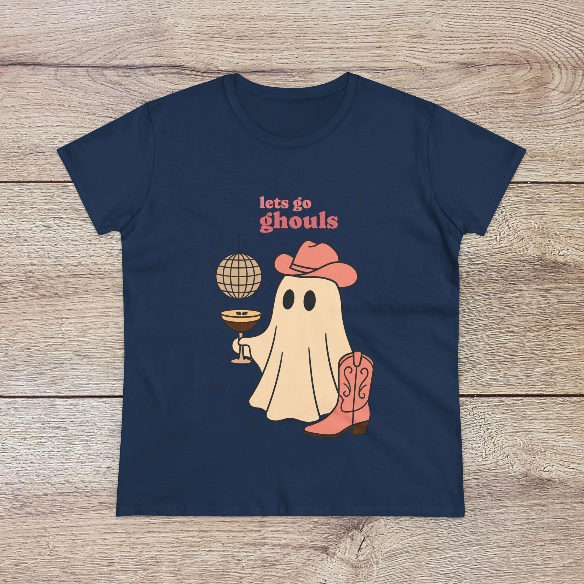 Let's Go Ghouls Tee in navy blue displaying a friendly ghost in a cowboy hat and boots, great for adding a whimsical touch to your Halloween wardrobe.