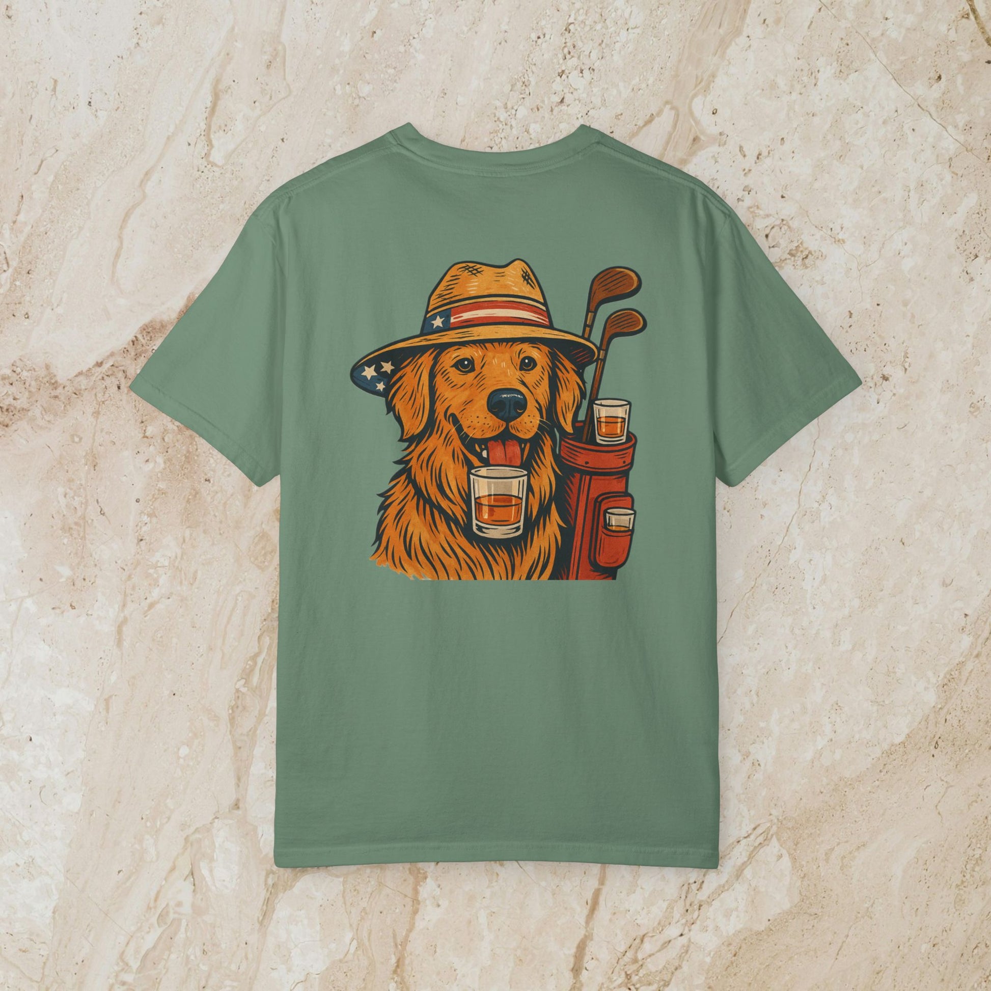 Golden Whiskey Dog Tee showcasing a playful illustration of a dog wearing a hat and holding a drink, designed with a unique vintage style, ideal for dog lovers.