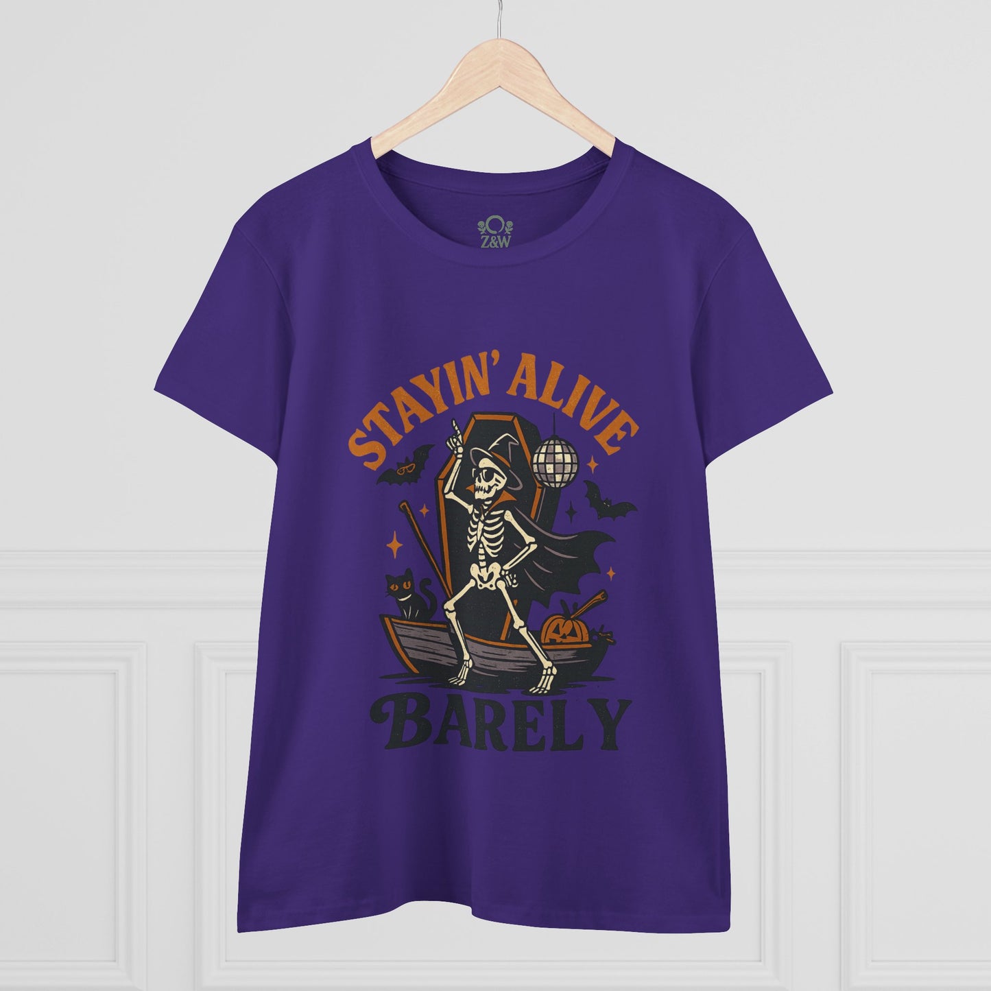 Front view of Stayin’ Alive T-Shirt featuring a whimsical skeleton design, perfect for fun Halloween celebrations.