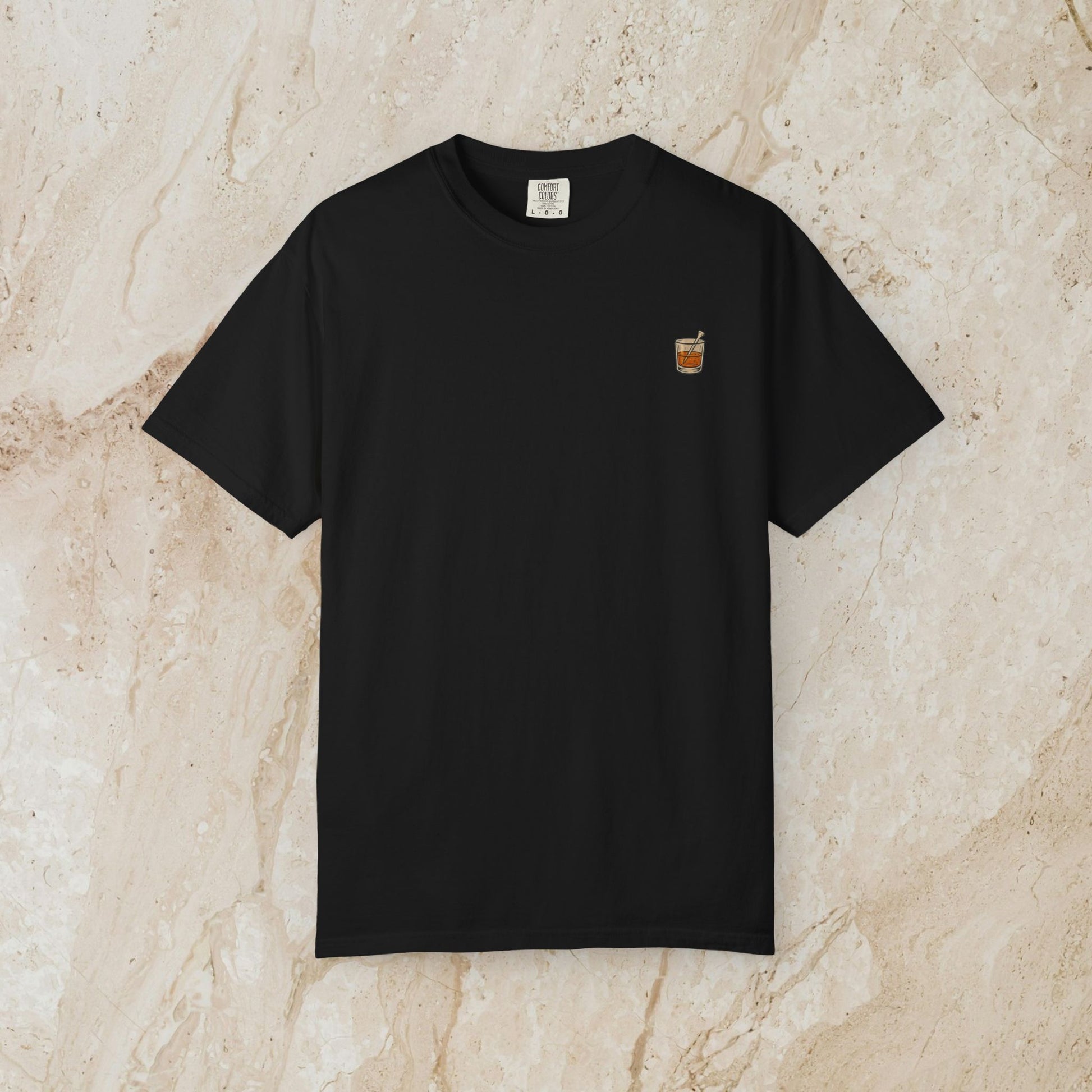 Golden Whiskey Dog Tee in black color, presenting a unique vintage style, crafted from 100% cotton with a relaxed fit and left chest pocket.