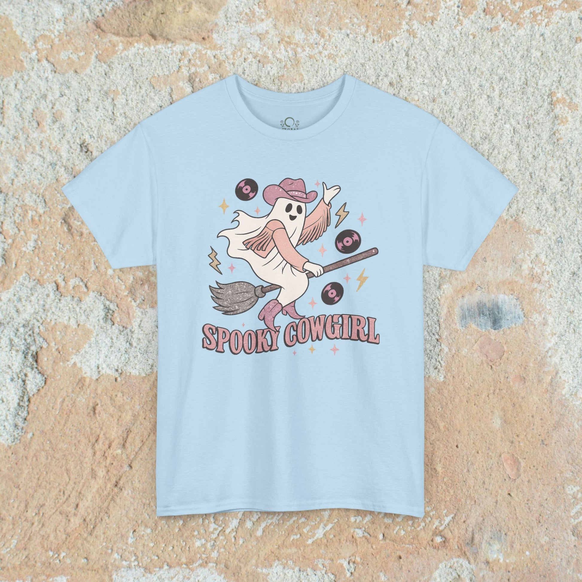 Spooky Cowgirl Graphic Tee - Soft Fabric, Eco-Friendly, Sizes S-5XL, designed in light blue with a playful ghost cowgirl and music records.