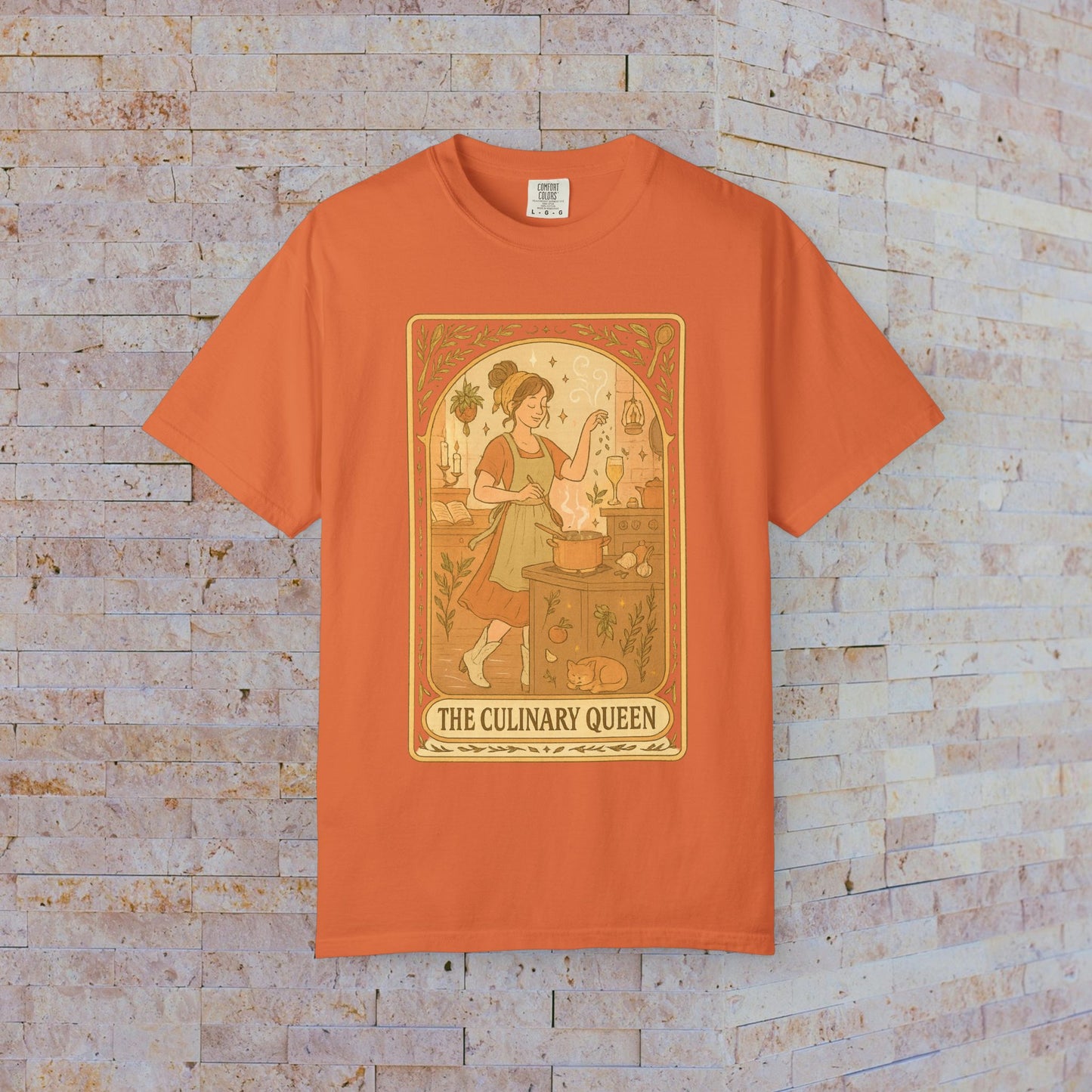 Culinary Queen Tarot Tee in orange, featuring an enchanting design of a girl engaging in cooking. Made of high-quality soft cotton, available in sizes S to 4XL, pre-shrunk.