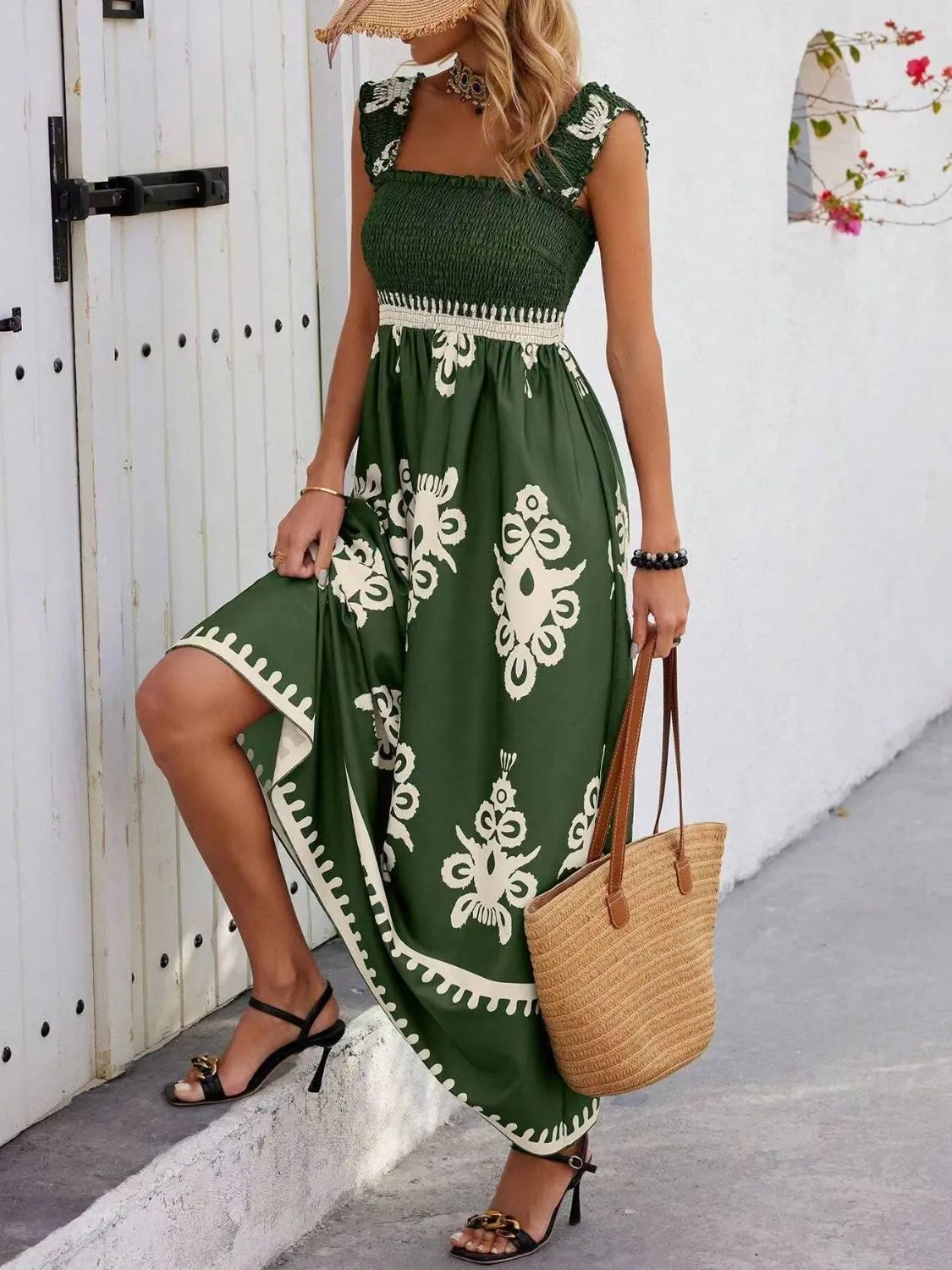 Trendsi Smocked Printed Maxi Dress with Wide Straps - Elegant Opaque, Non-Stretch Design, modeled by a woman with a stylish handbag, emphasizing its elegant embroidery.