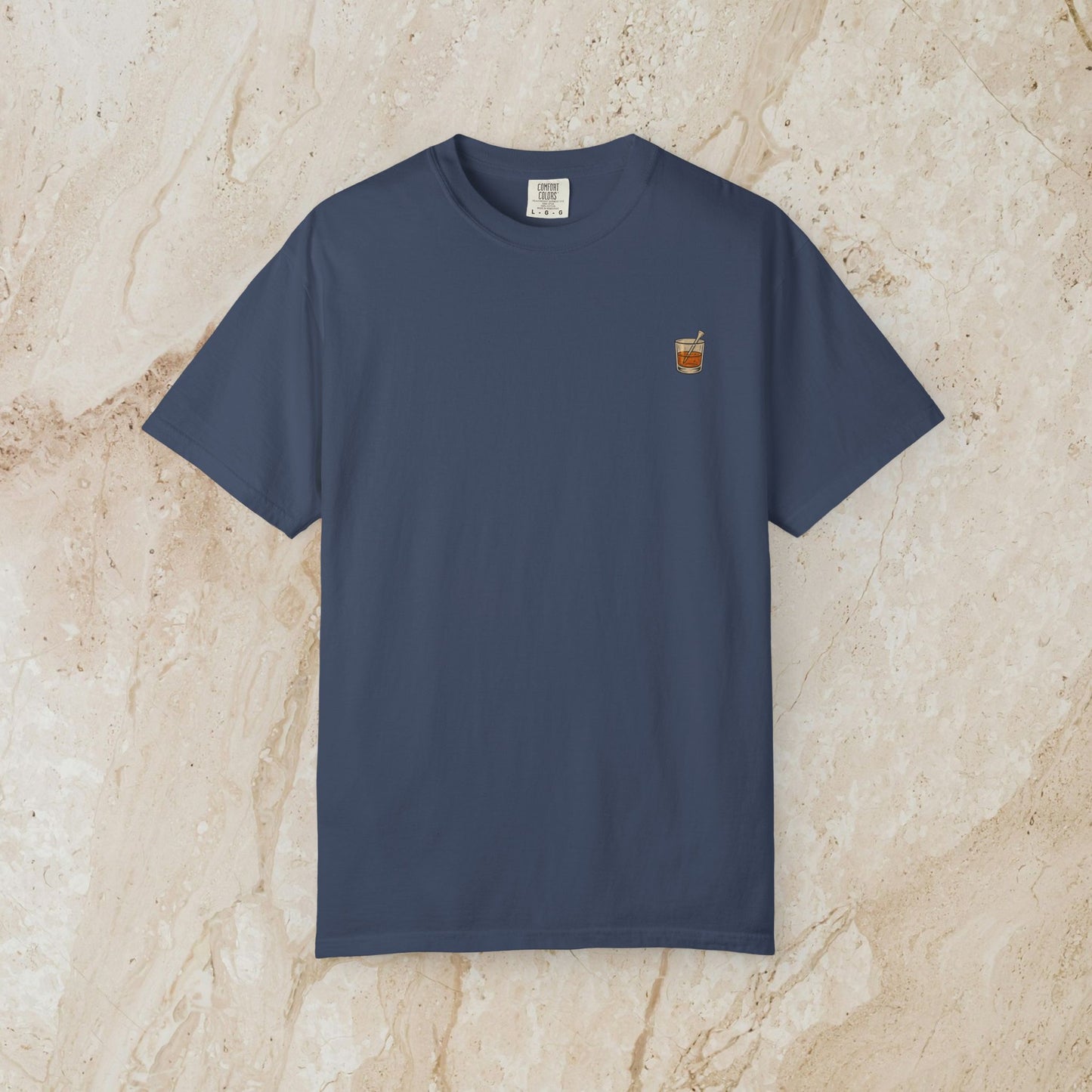 Golden Whiskey Dog Tee in navy blue color, designed with a unique vintage style, crafted from 100% cotton, featuring a relaxed fit and left chest pocket.