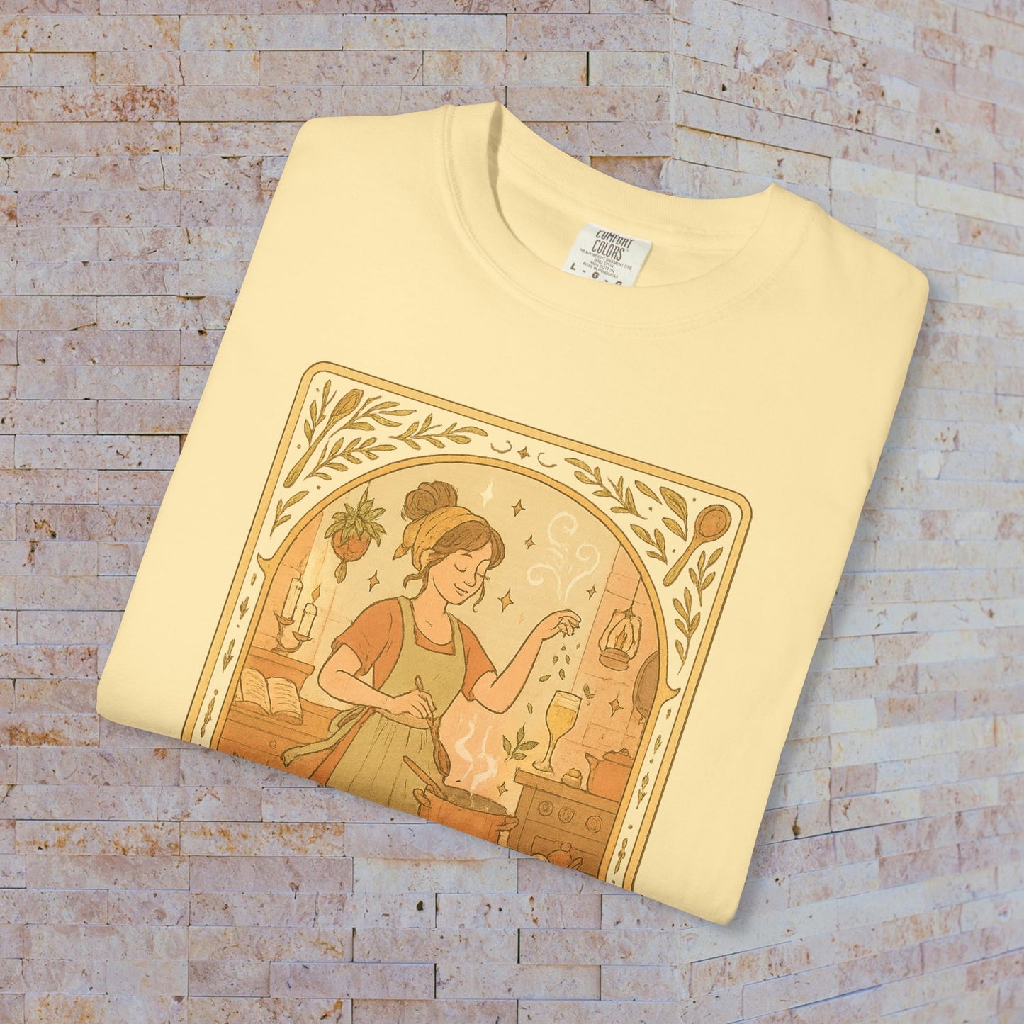 Culinary Queen Tarot Tee in light yellow, depicting a charming image of a woman surrounded by culinary elements, available in sizes S to 4XL, made from soft cotton.