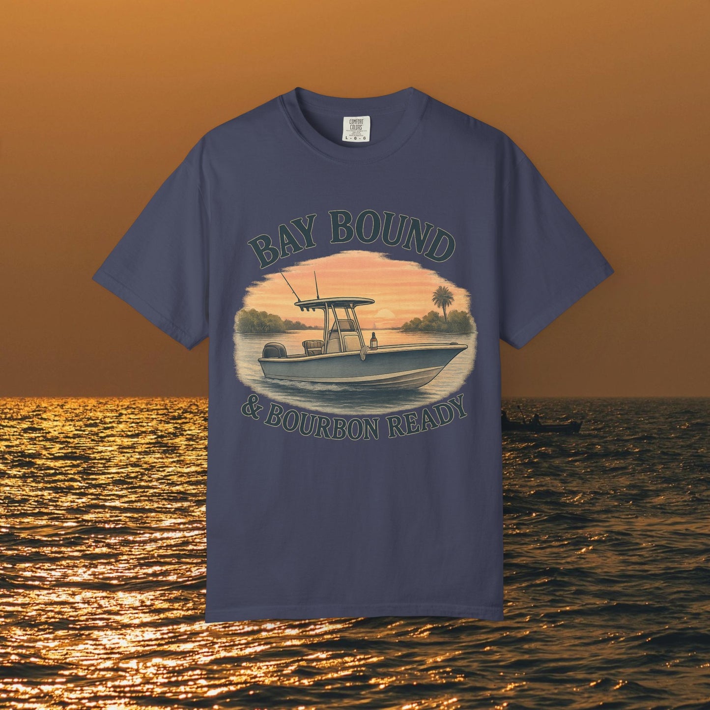 Bay Bound & Bourbon Ready T-Shirt in navy, displaying a boat design with a beautiful sunset, a great choice for beach and water enthusiasts.