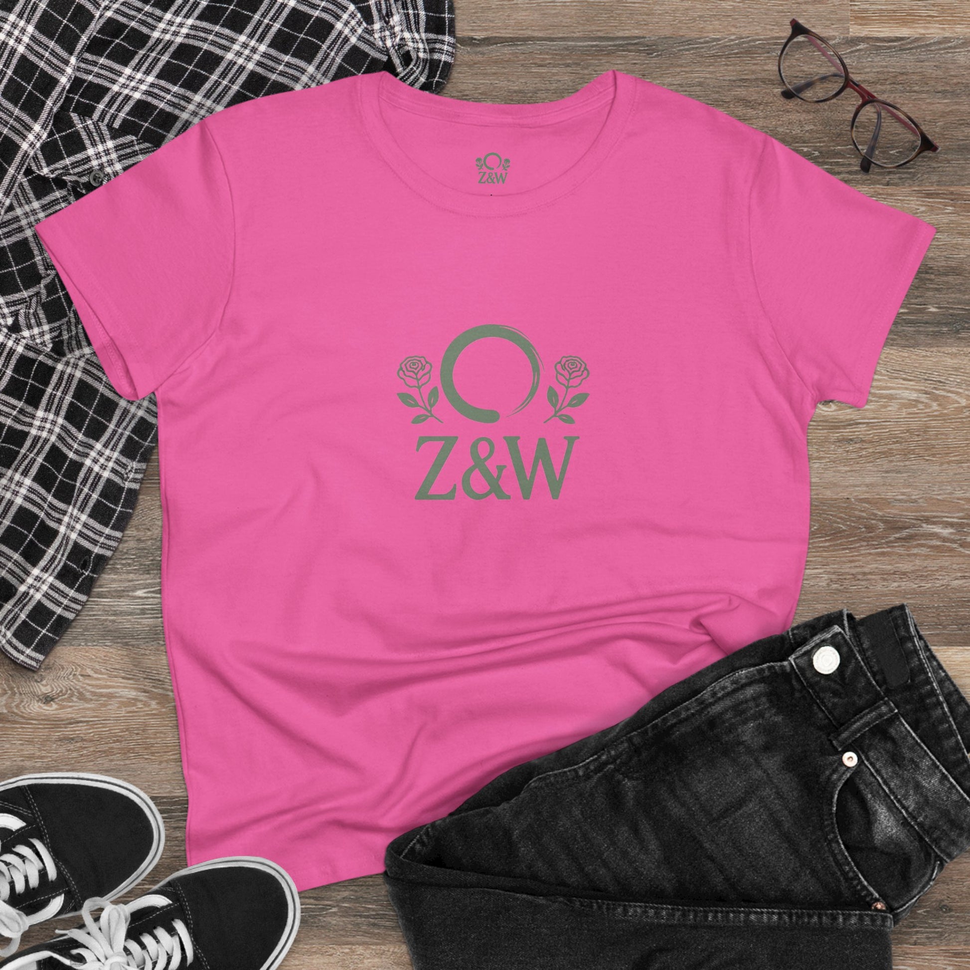 ZenAndWhiskey Classic 100% Cotton Tee laid flat in pink color, featuring the Z&W logo with roses, ideal for casual wear or relaxed outings.