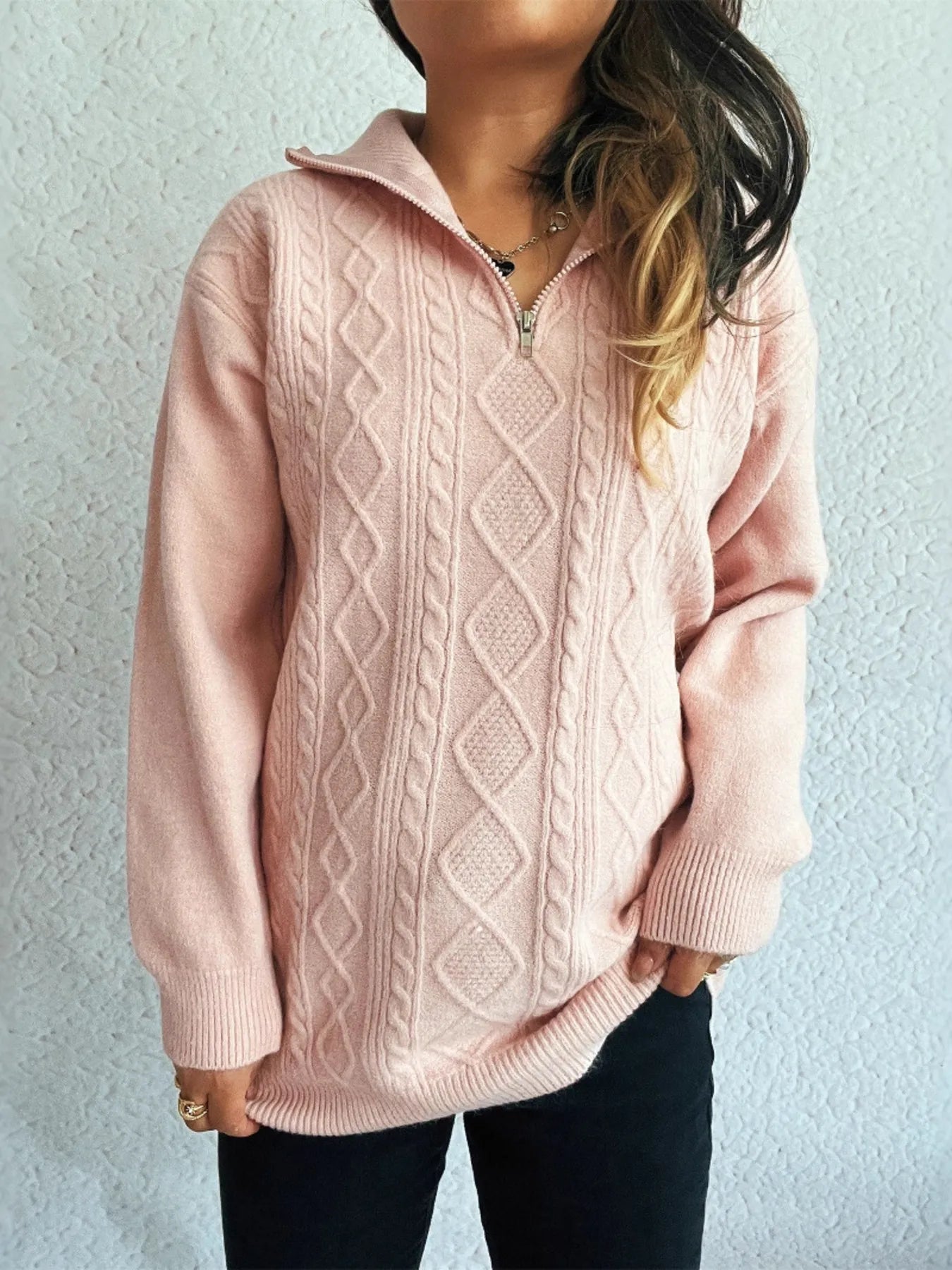 Cozy Cable-Knit Texture Zip Collar Long Sleeve Sweater in light pink color, featuring a zipper collar and a relaxed fit, perfect for a comfortable look.