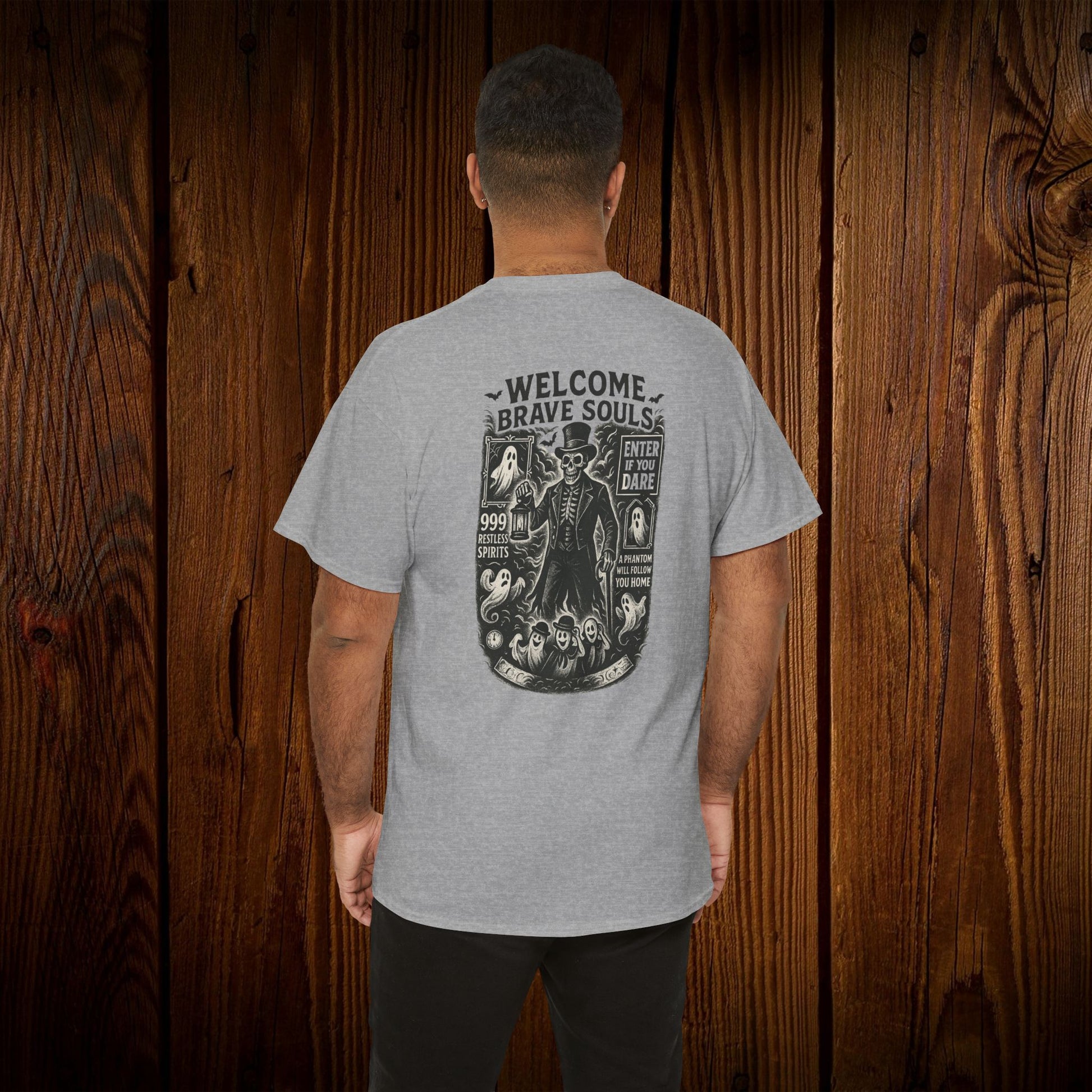 Spooky Halloween Graphic Tee displayed on a model from the back, highlighting the intricate skeleton and ghost design, perfect for daring Halloween outfits.