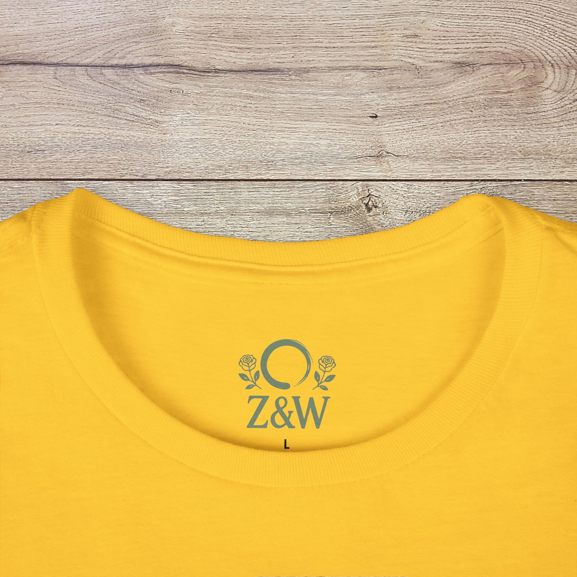 Close-up of the back neckline of a yellow Funny Pilates T-Shirt with a stylish logo, designed for durability and everyday wear.