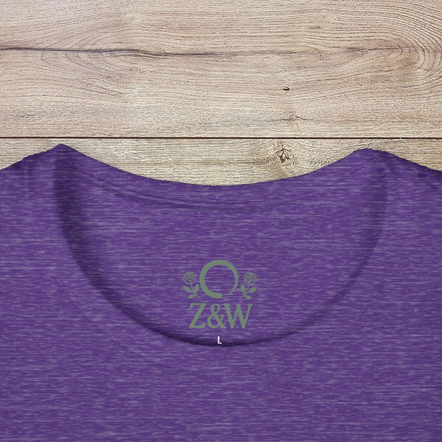 Detailed view of the collar on a purple Funny Pilates T-Shirt highlighting the unique design and fabric quality.