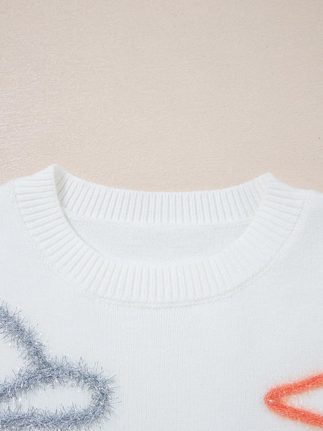 Close-up of the neckline of the Western Style Knit Crew Neck Sweater with Horseshoe Star & Slightly Stretchy Fabric, showing its ribbed collar and soft material for comfort.
