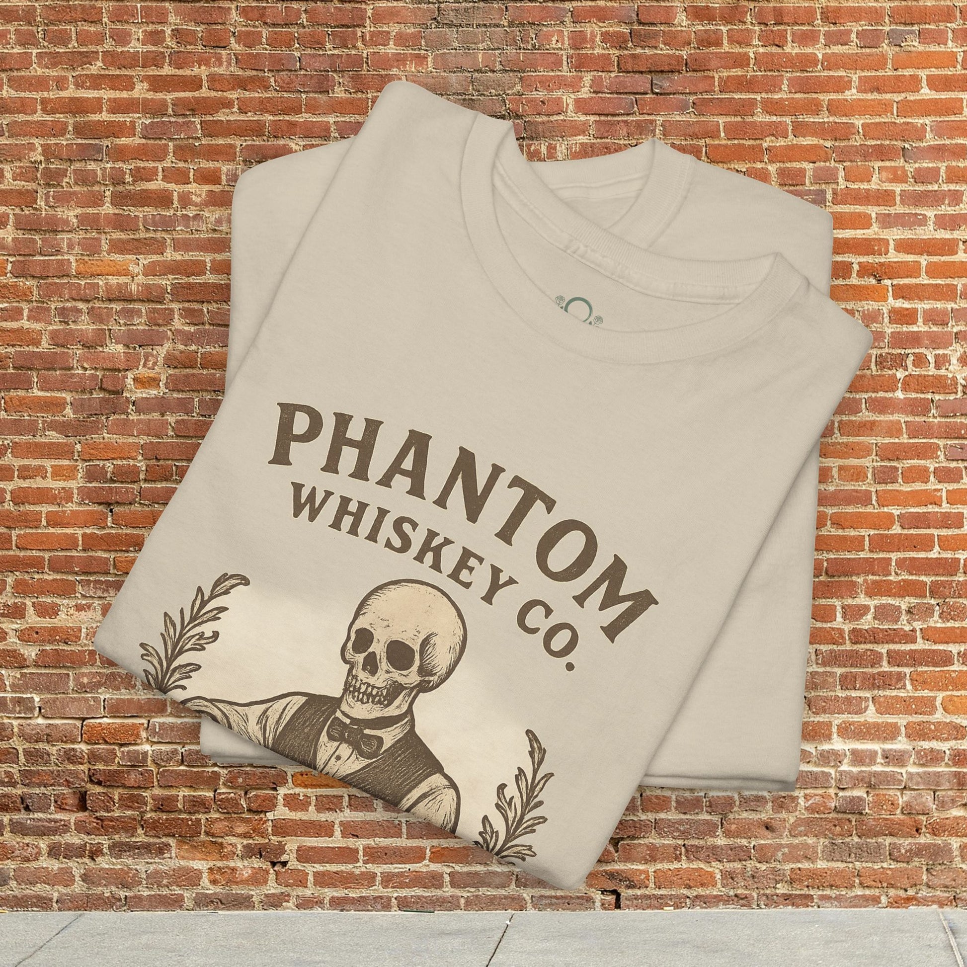 Vintage Skull Whiskey Lover Unisex Tee - Retro Casual Party Shirt showcasing a skeleton graphic, perfect for Halloween gifting, on a beige background.