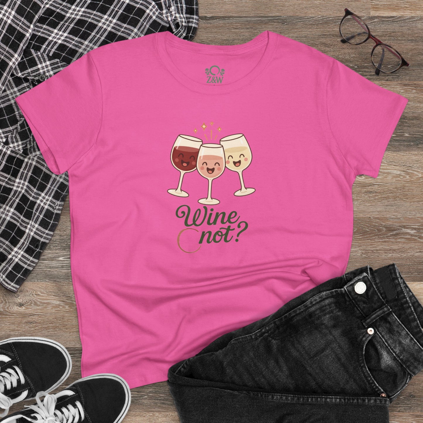 Casual styling of the Wine Not Tee in pink, paired with jeans and accessories, highlighting its versatility for everyday wear.