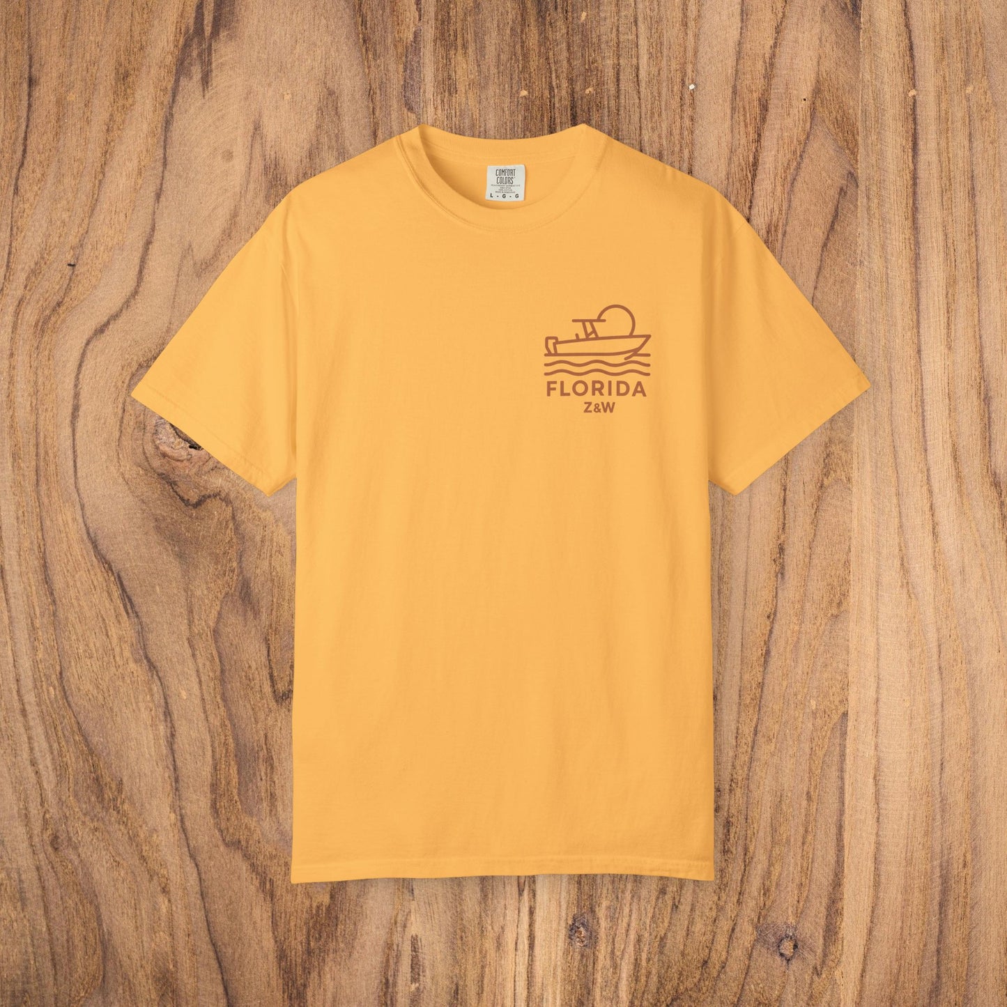 Unisex Florida Graphic Tee in vibrant yellow, designed for comfort and style, ideal for casual wear while showcasing a unique Florida-themed graphic.