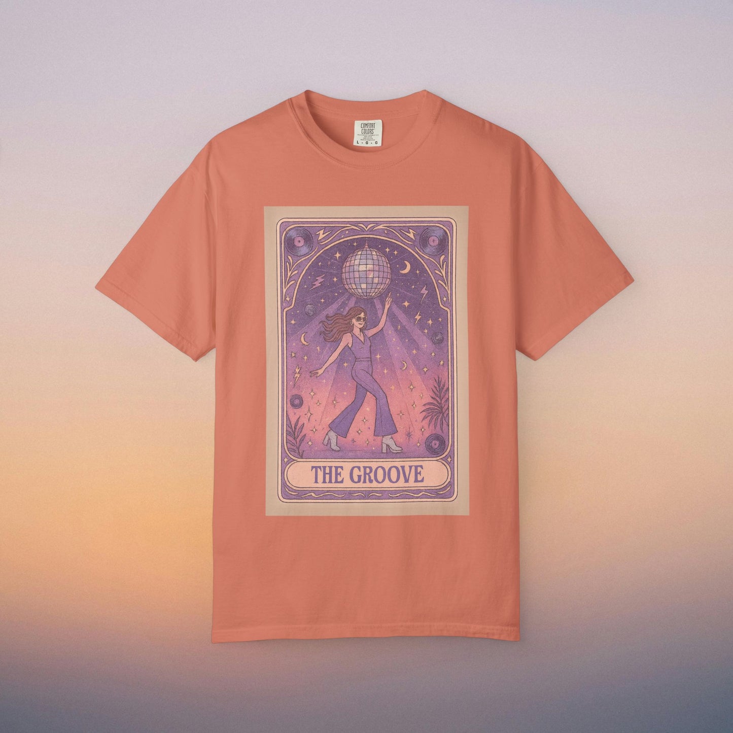 Groove Tarot Graphic Tee in coral, featuring a vibrant design with a character holding a disco ball, crafted from 100% ring-spun cotton, ideal for both men and women.