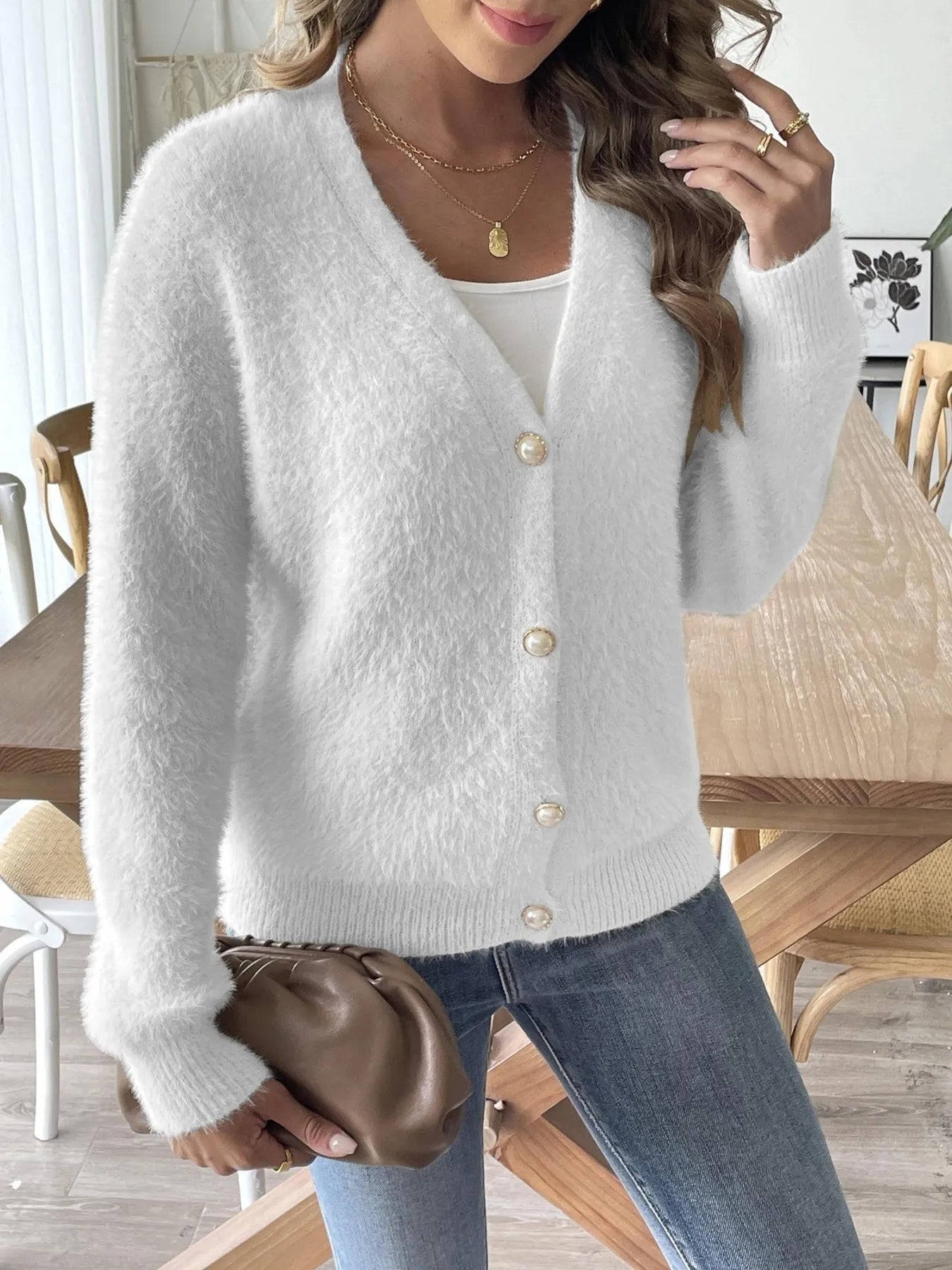 Trendsi Fuzzy Button-Front Cardigan in white, styled elegantly with a casual outfit, showcasing its comfortable and chic appeal.