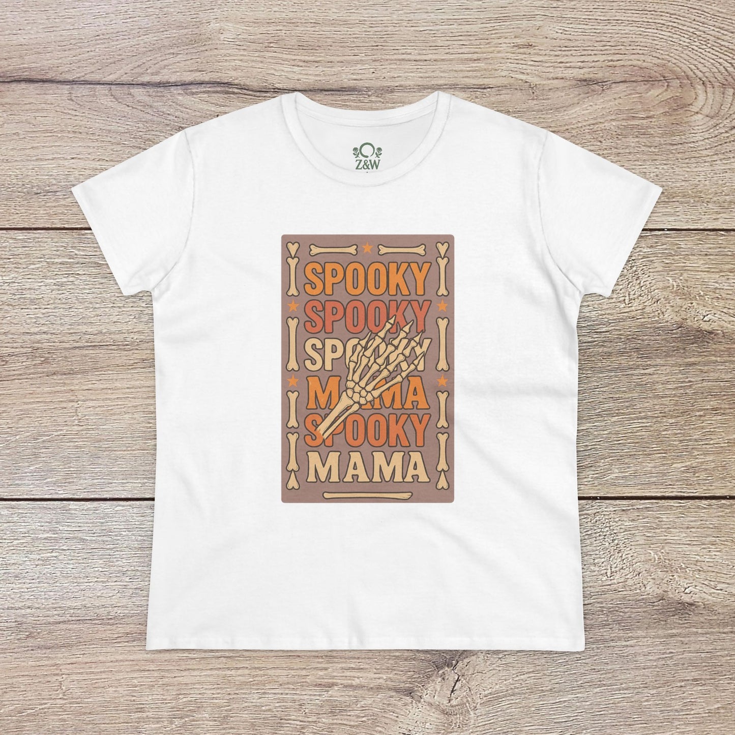 Spooky Mama Tee in white - Soft cotton fabric, featuring a playful Halloween-themed design with the words 'Spooky Mama'. Perfect for casual wear and versatile for all occasions.
