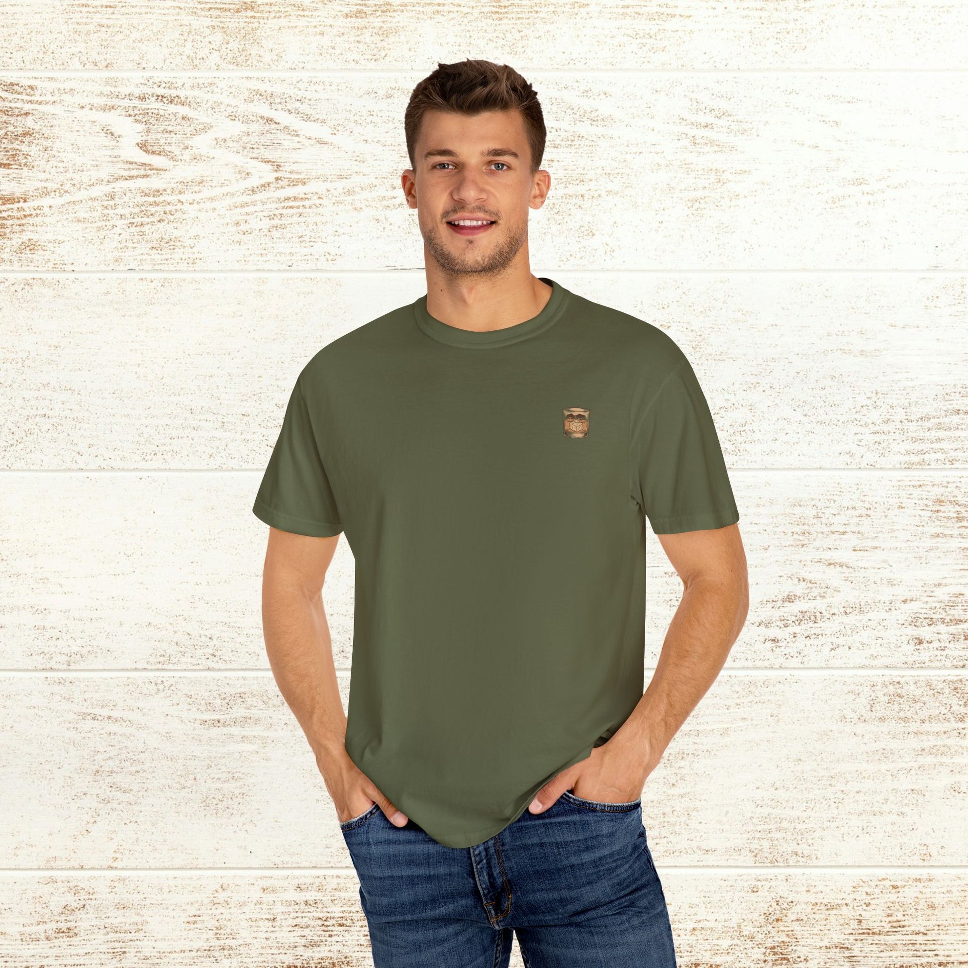 Model wearing the Rodeo On The Rocks Tee, a soft 100% US cotton shirt with a unique design. Ideal for everyday style, available in various sizes for a comfortable fit.