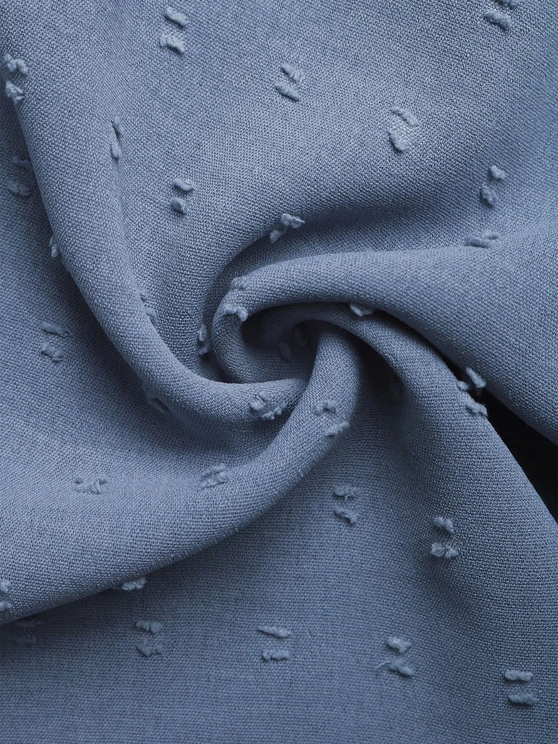 Swiss Dot Lace Up Shorts - Fabric swirl displaying the unique swiss dot pattern and material quality.