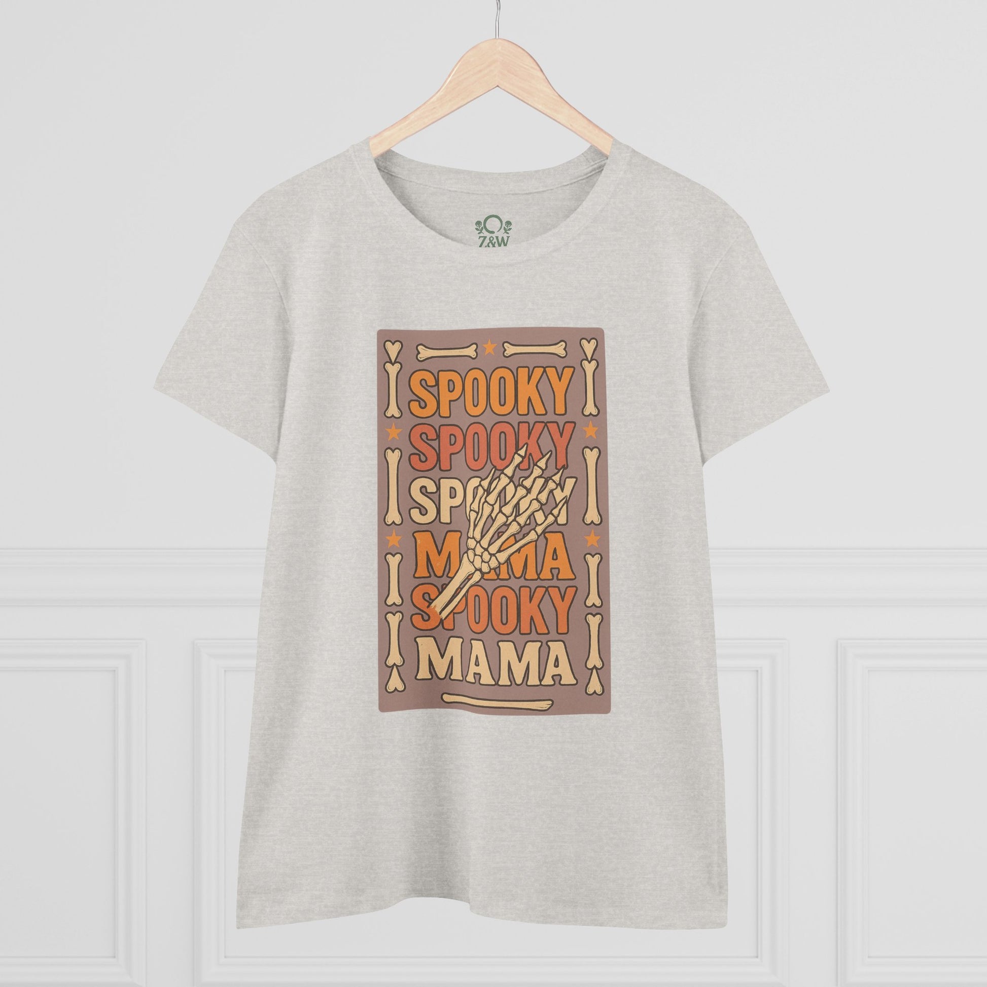 Spooky Mama Tee, a soft cotton t-shirt featuring a playful skeletal design, perfect for Halloween or casual wear.