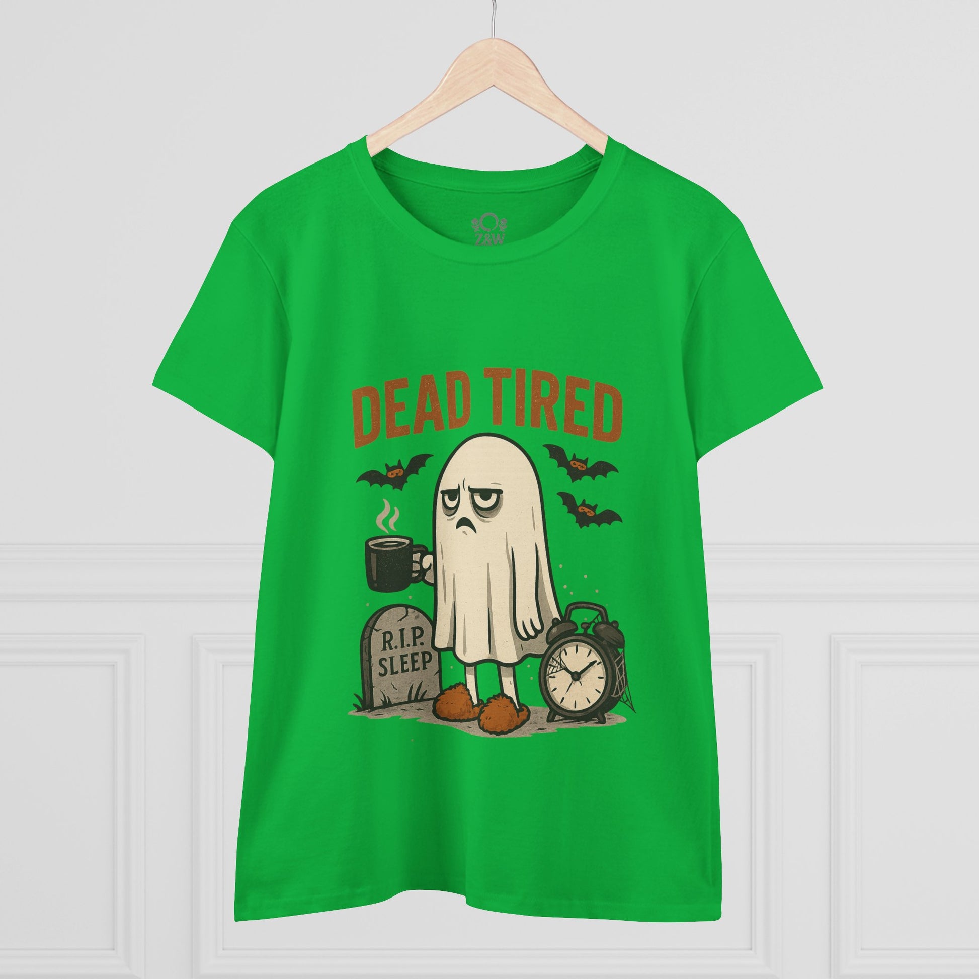 Cute Whimsical Ghost T-Shirt for Halloween featuring a sleepy ghost design with the text 'DEAD TIRED', printed on a vibrant green t-shirt, perfect for cozy celebrations.