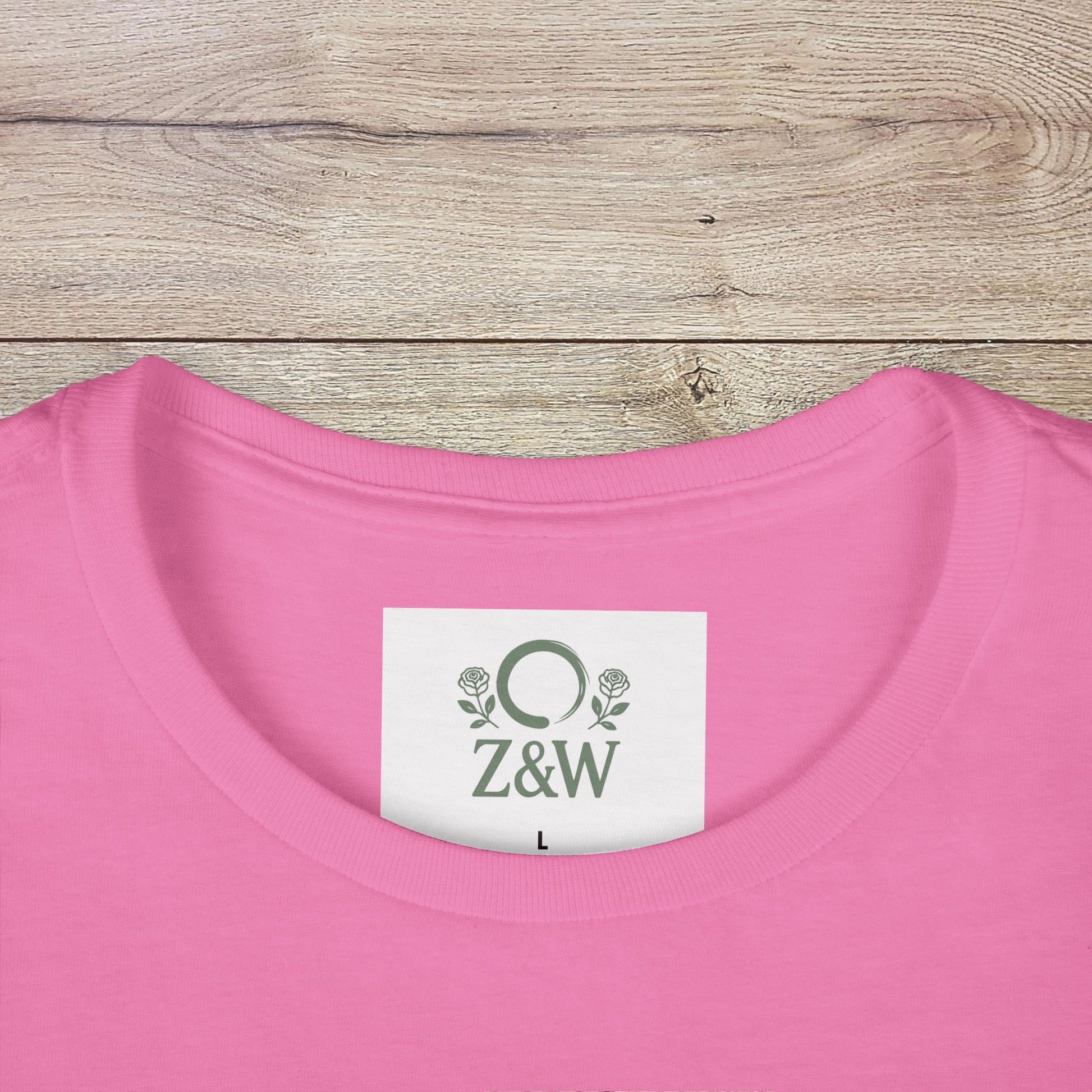 Close-up of the collar label of Sippin' Through The Seasons Slim Fit Tee in pink color, displaying the Z&W brand and size L, crafted from 100% combed cotton for softness.