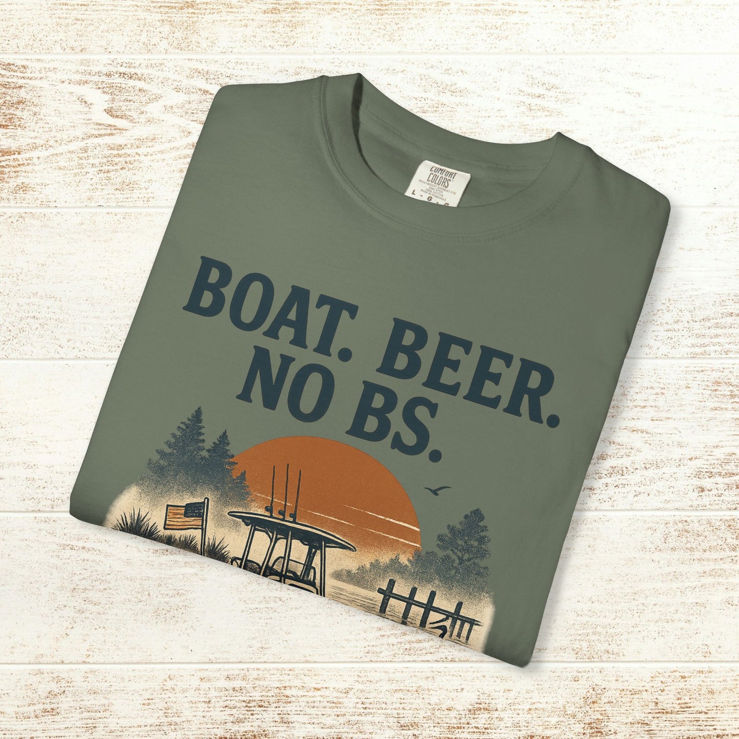Flat lay of Boat Beer No BS Tee in green, showcasing a scenic fishing boat and sunset design, ideal for outdoor enthusiasts.