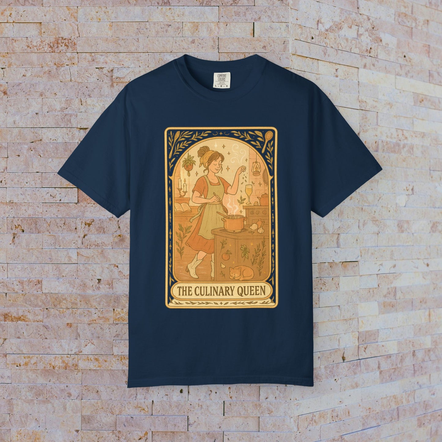 Culinary Queen Tarot Tee in navy blue, featuring a whimsical design of a queen cooking, available in sizes S to 4XL, made from soft, pre-shrunk cotton.