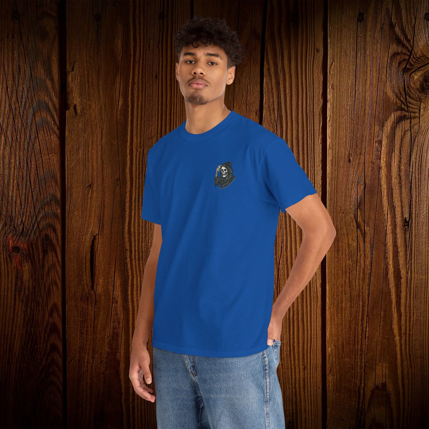 Spooky Halloween Graphic Tee - Unisex Cotton Shirt with a ghostly graphic on the front, perfect casual wear in bright blue for celebrating Halloween festivities.