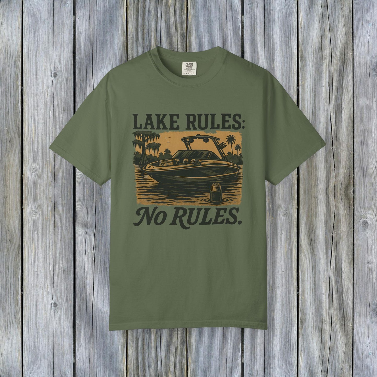 Unisex Garment-Dyed Lake Rules Tee in olive green color showcasing a lake setting with 'Lake Rules: No Rules.' text, made from soft vintage fabric, ideal for outdoor enthusiasts.