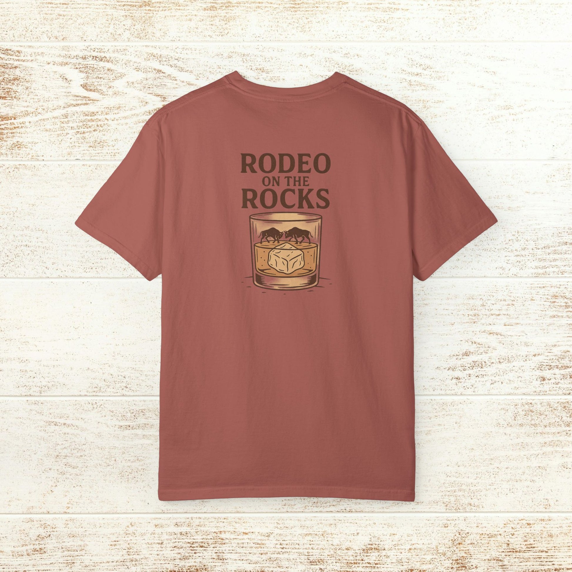 Rodeo On The Rocks Tee in a rich color, displaying a striking graphic of a drink glass on the back, ideal for unique fashion statements.