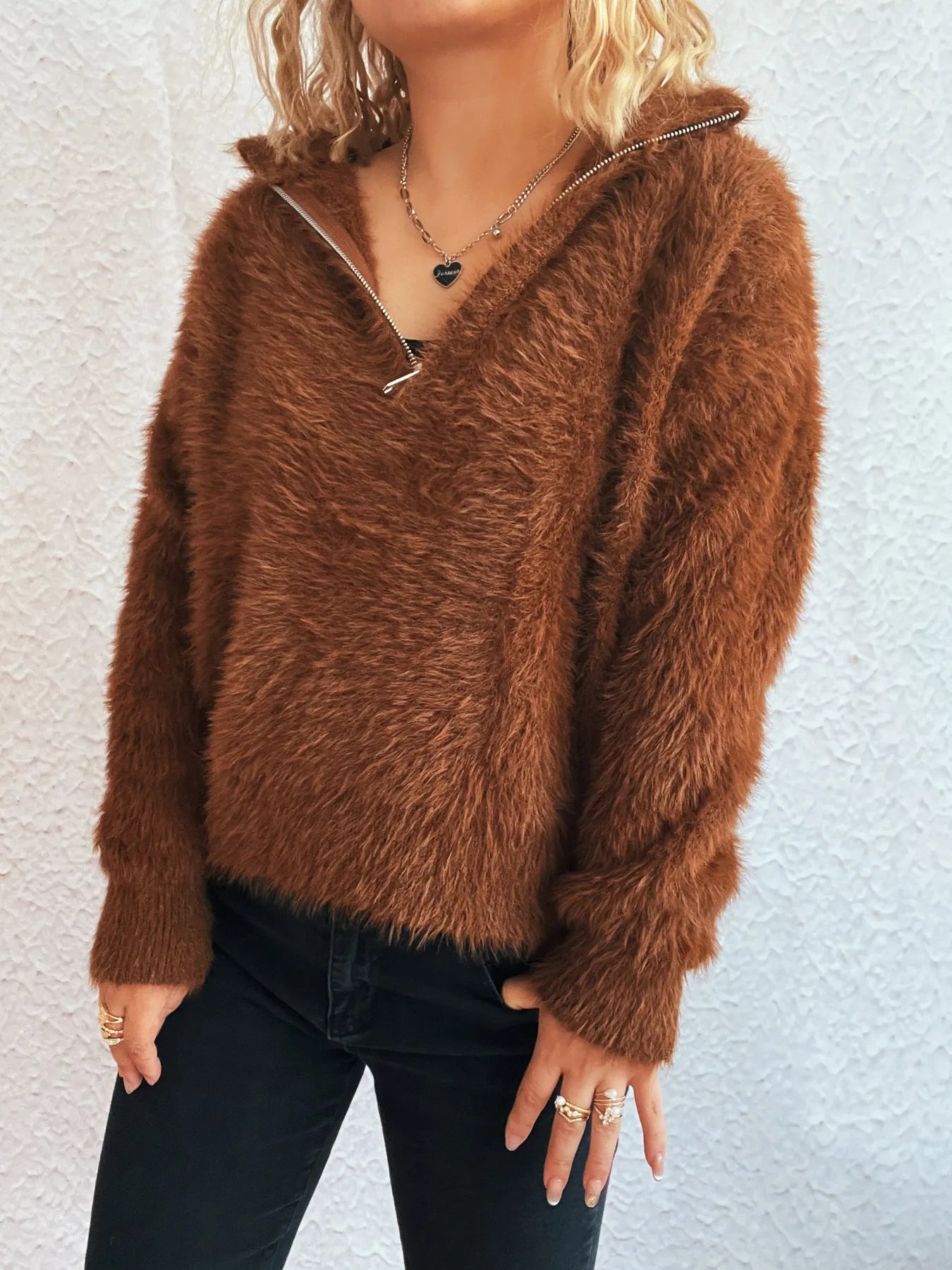 Cozy Fuzzy Half-Zip Sweater for Women in elegant brown, tailored for comfort with its fluffy feel and half-zip feature, displayed in a stylish pose to accentuate its modern design.