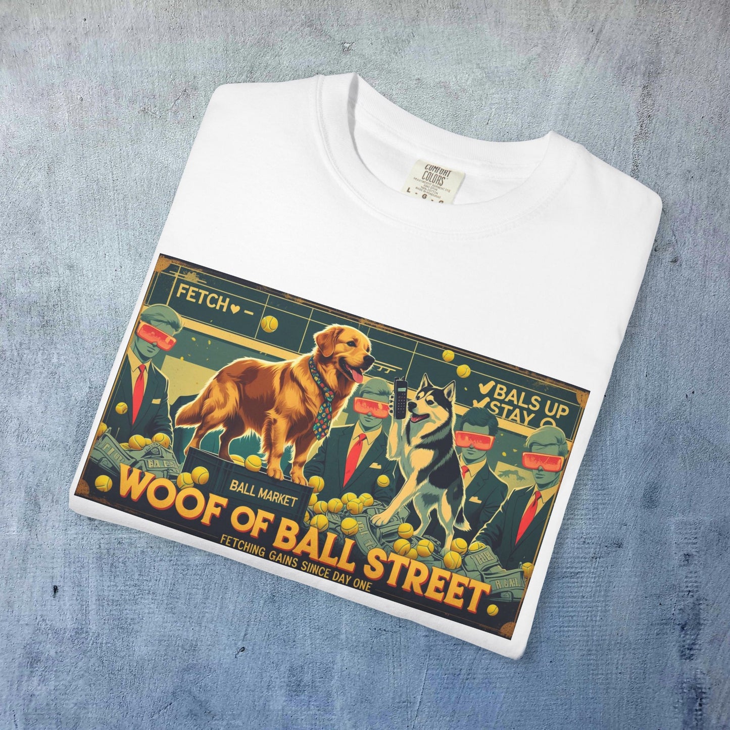 Flat lay of the Sleek Woof of Ball Street T-Shirt in white, presenting the fun graphic design with dogs and a playful stock market theme.